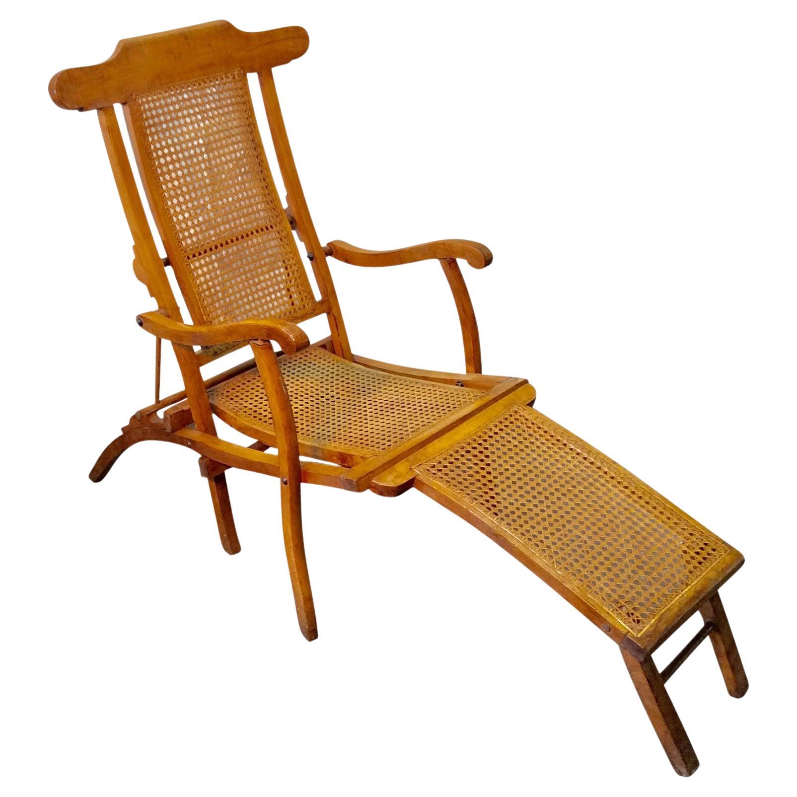 Early 20th Century French Walnut and Cane Steamer Chair For Sale