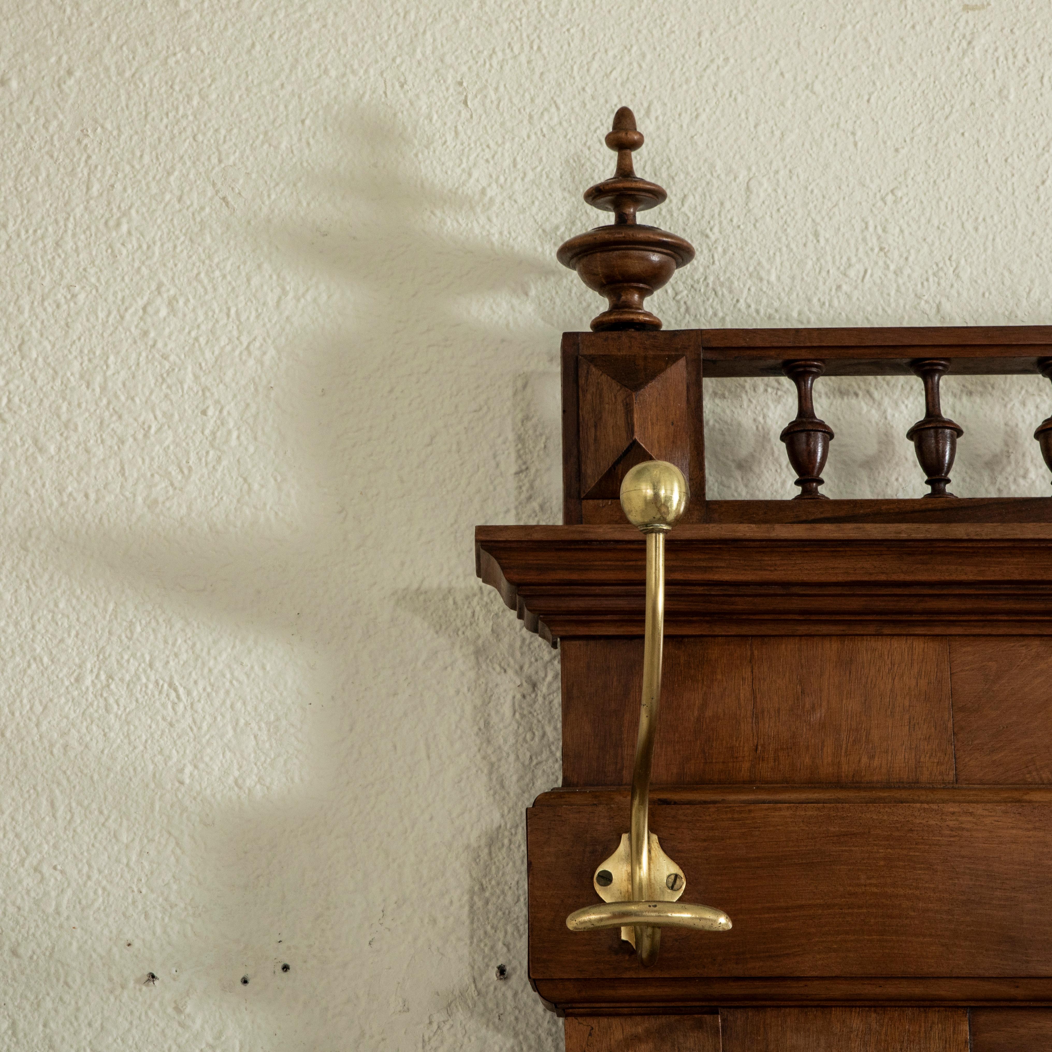 Brass Early 20th Century French Walnut Hall Tree with Beveled Glass Mirror For Sale