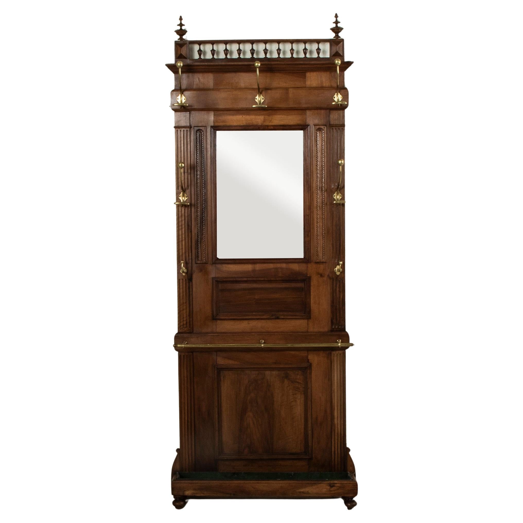 Early 20th Century French Walnut Hall Tree with Beveled Glass Mirror