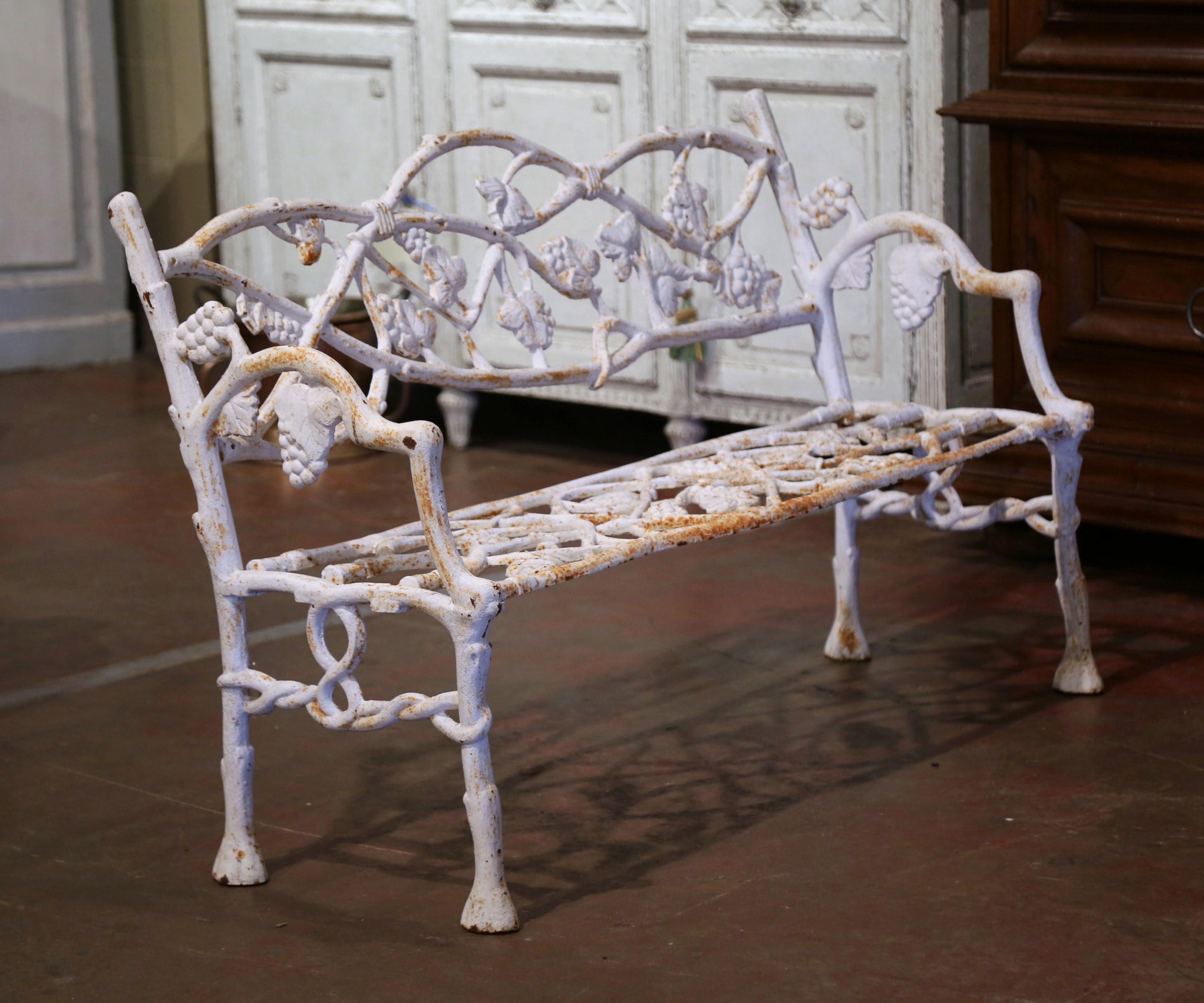 Early 20th Century French White Painted Cast Iron Garden Bench with Vine Motifs In Excellent Condition In Dallas, TX