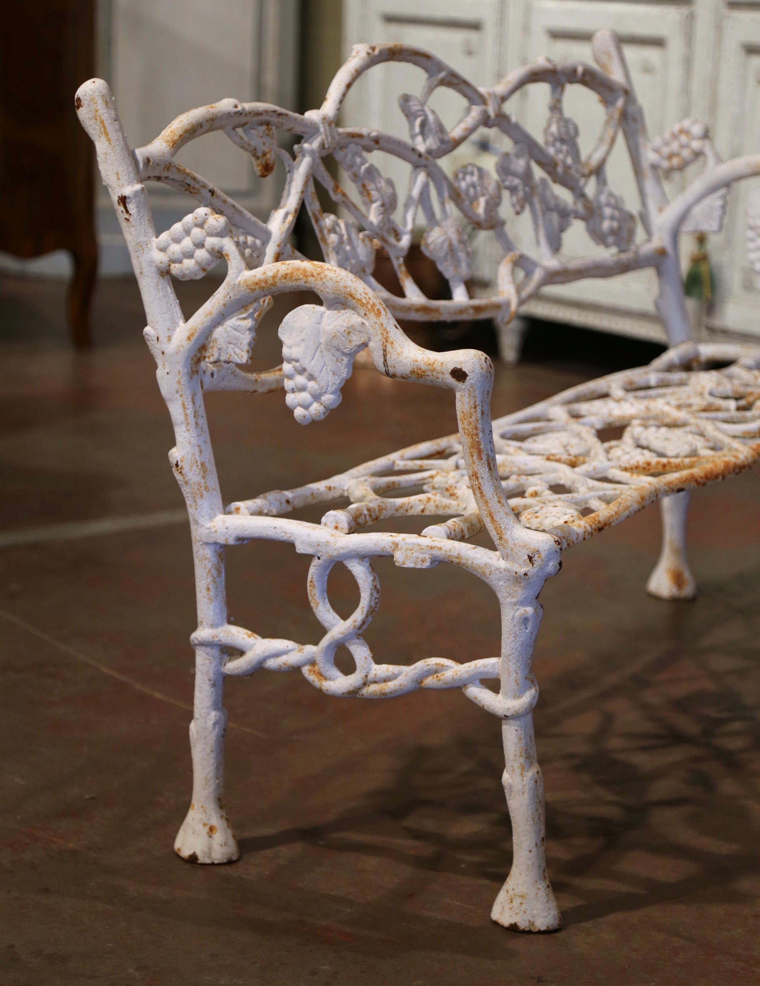 Early 20th Century French White Painted Cast Iron Garden Bench with Vine Motifs 1