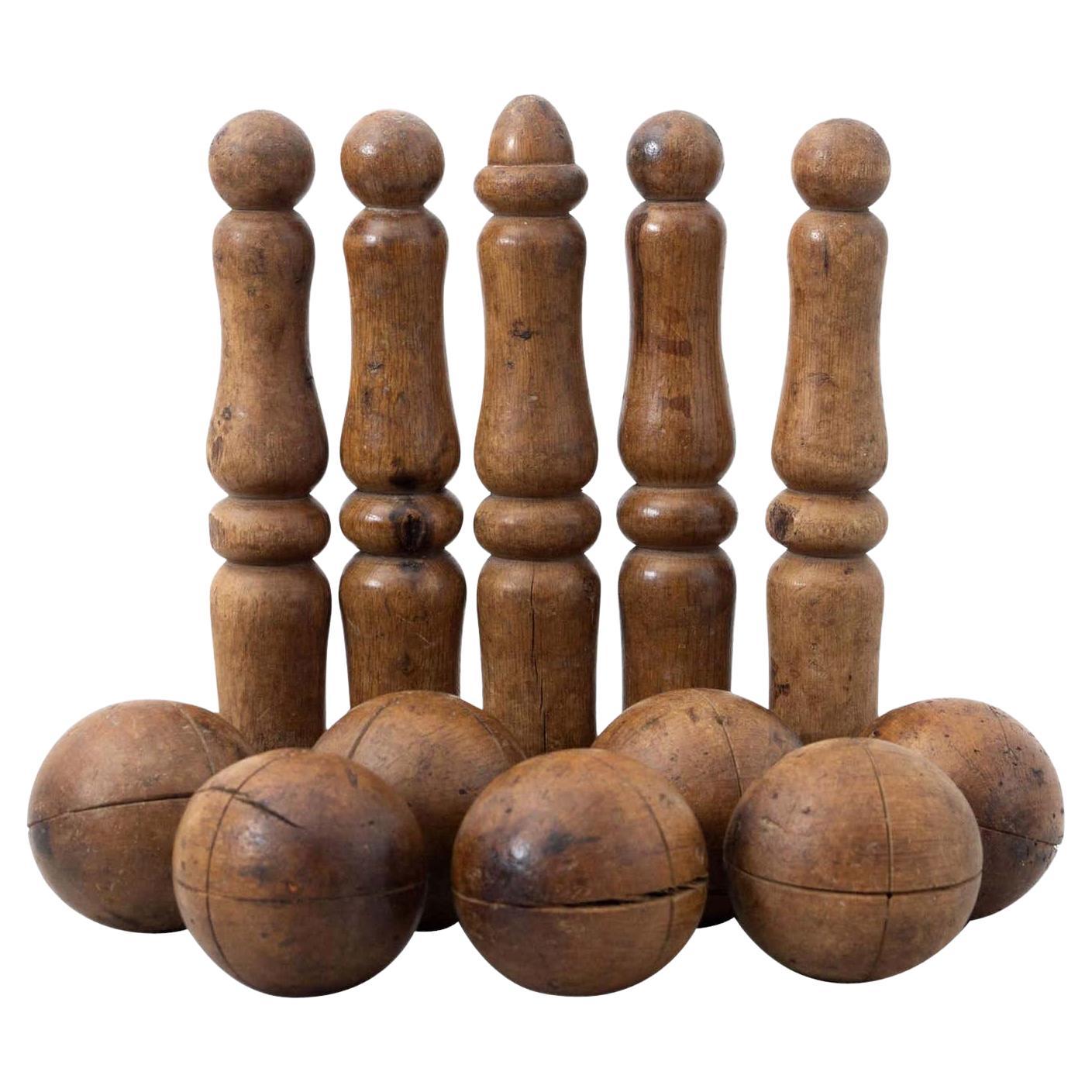 Early 20th Century French Wooden Bowling Game: Rustic Artwork & Timeless Fun