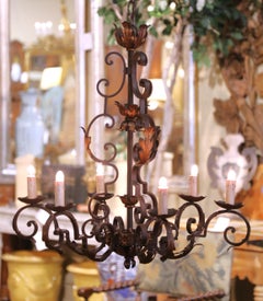 Early 20th Century French Wrought Iron Six-Light Chandelier with Gilt Leaves