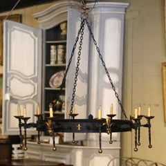 Early 20th Century French Wrought Iron Ten-Light Chandelier with Fleurs-de-Lys