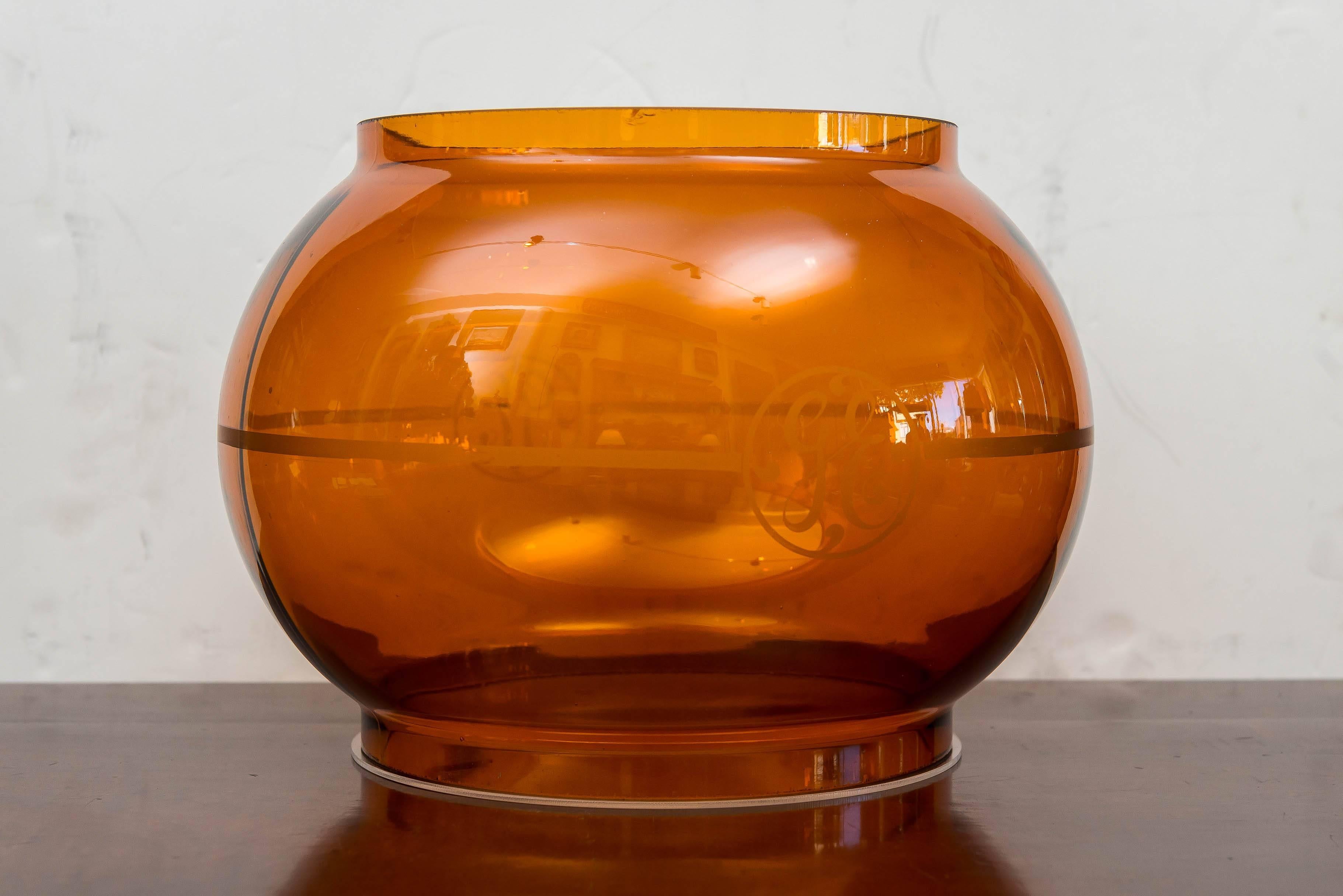Early 20th century G E Light (Arc) diffuser globe. Like globes displayed at the 1915 Pan Pacific Exposition in San Francisco, circa 1915. Acid etched G E (General Electric) logo on two sides with a meridian ring. Heavy blown glass with ground edges