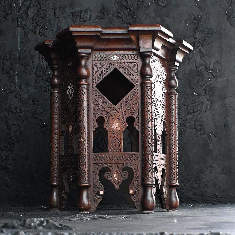 Early 20th century Geometric shaped Syrian table 

A very well-proportioned early 20th century geometric shaped inlaid Syrian side table. An easily place table with wonderful design form, aged repairs are present, and some detail is missing as you