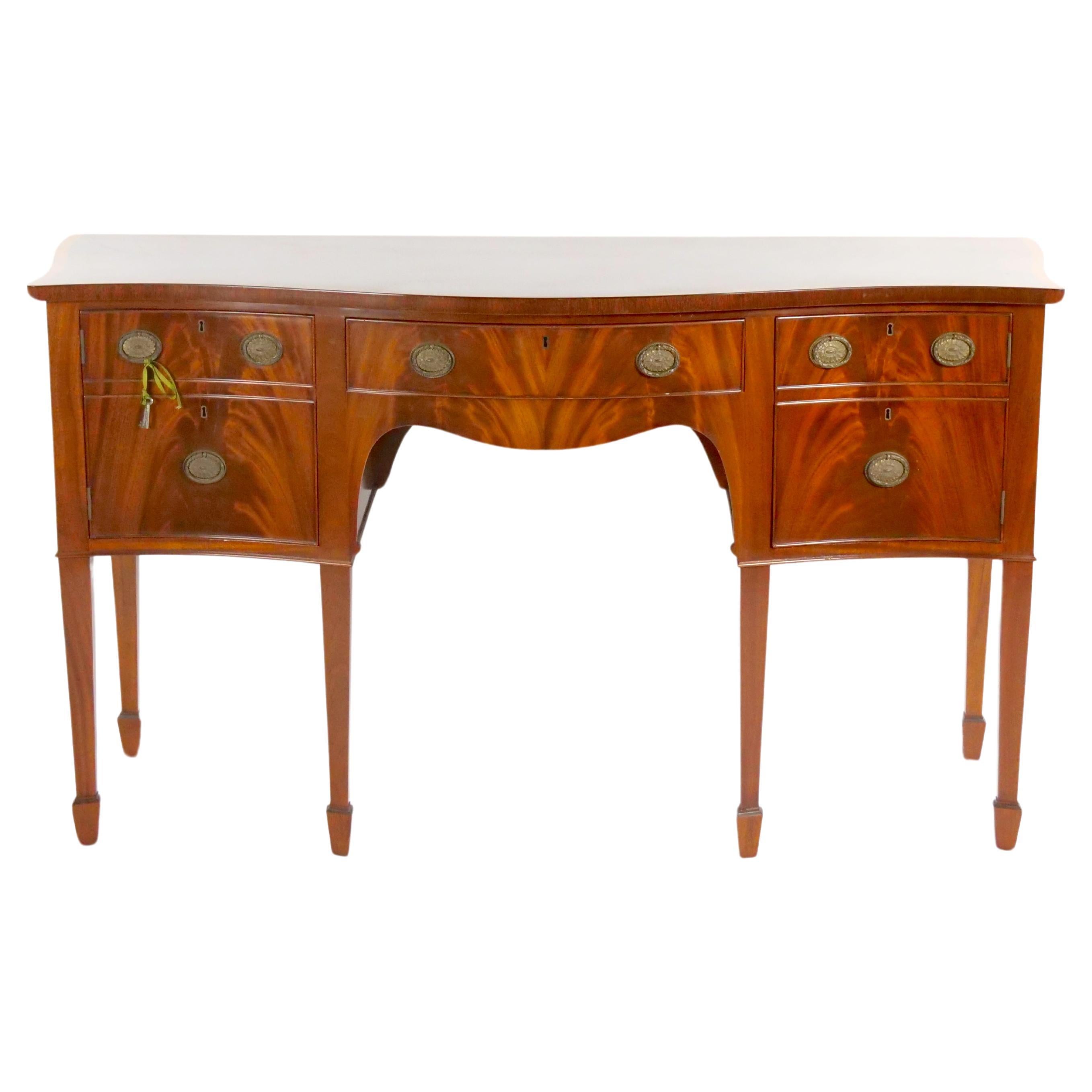 Early 20th Century George III Flame Mahogany Serpentine Sideboard / Server For Sale
