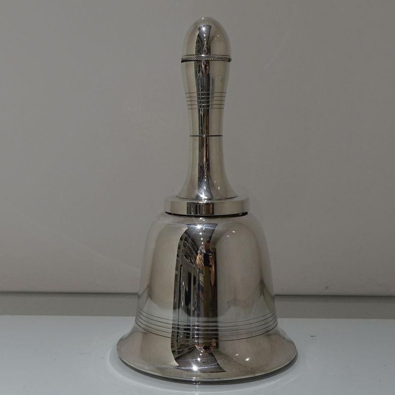 A stylish and highly collectable bell shaped cocktail Shaker manufactured by the highly desirable Asprey & Co. The Shaker is detachable at two sections. 



Height: 11 inches/28cm 

Diameter: 6 inches/15cm (bowl).