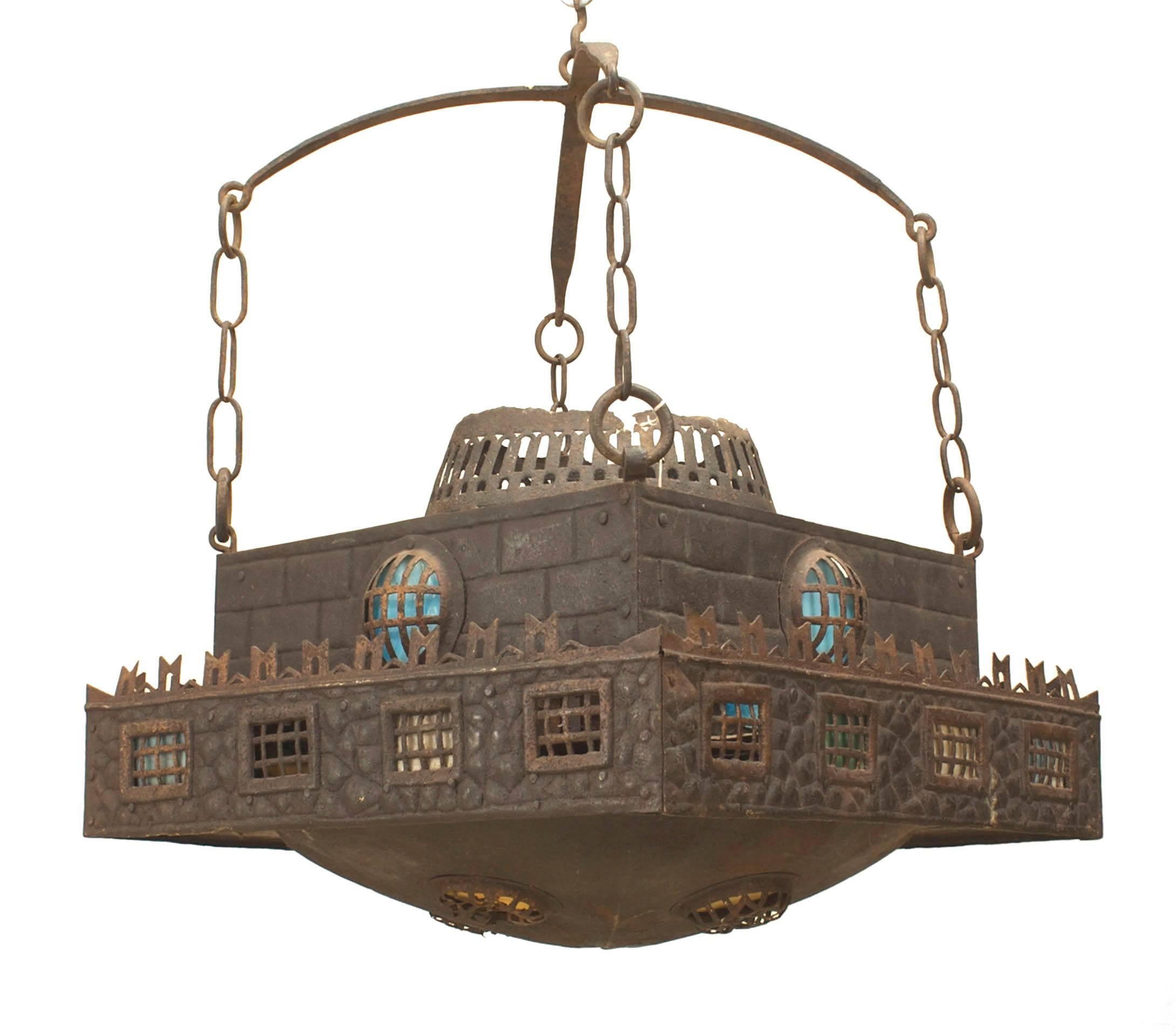 Continental German (1st Quarter 20th Century) wrought iron square chandelier with filigree design and stained glass panels suspended by 4 chains.
