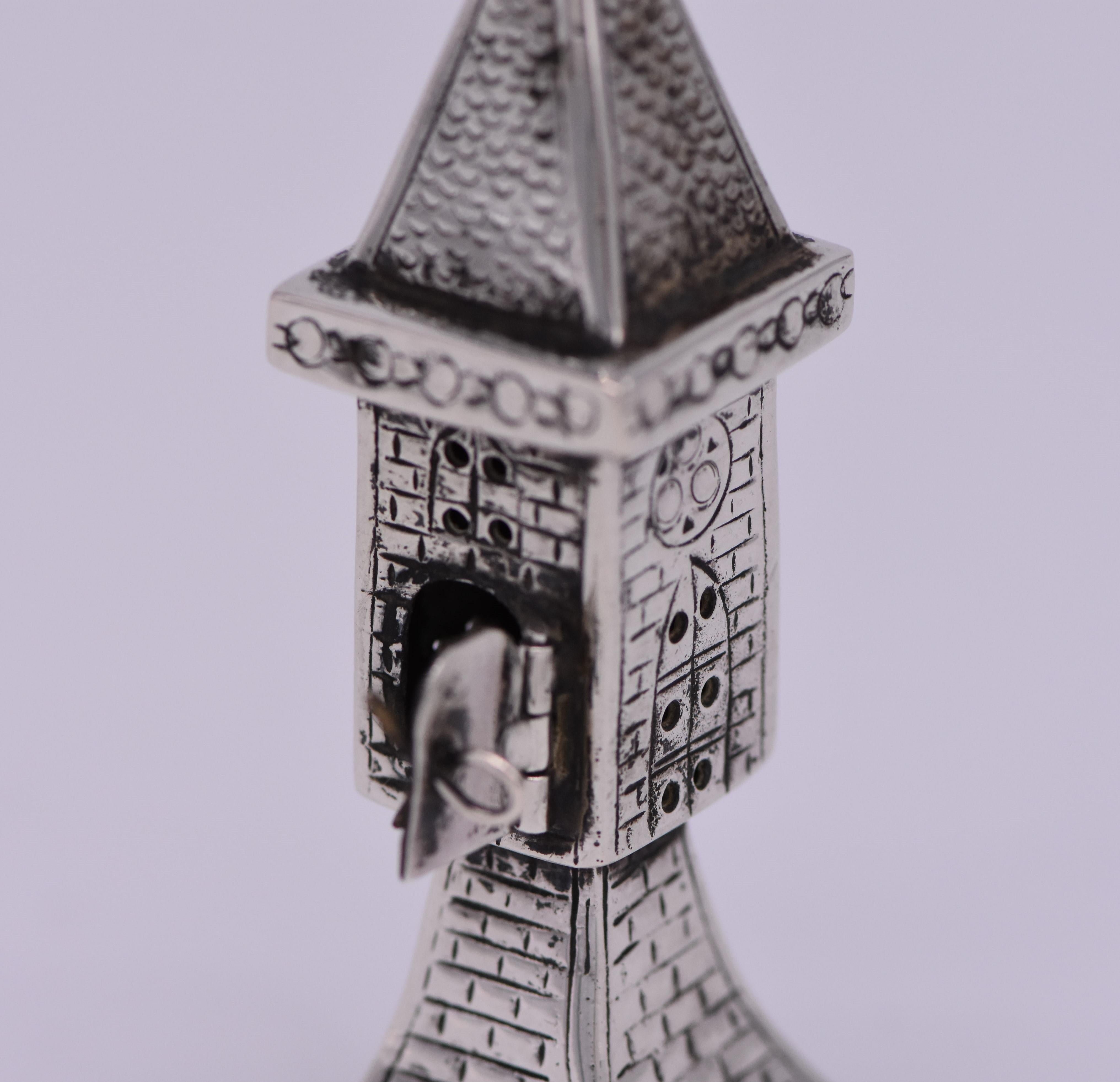 Silver spice container, Germany, circa 1900.
In the shape of a Gothic castle, hand engraved, topped with a silver flag.
Marked on the bottom with German silver hallmarks.

 