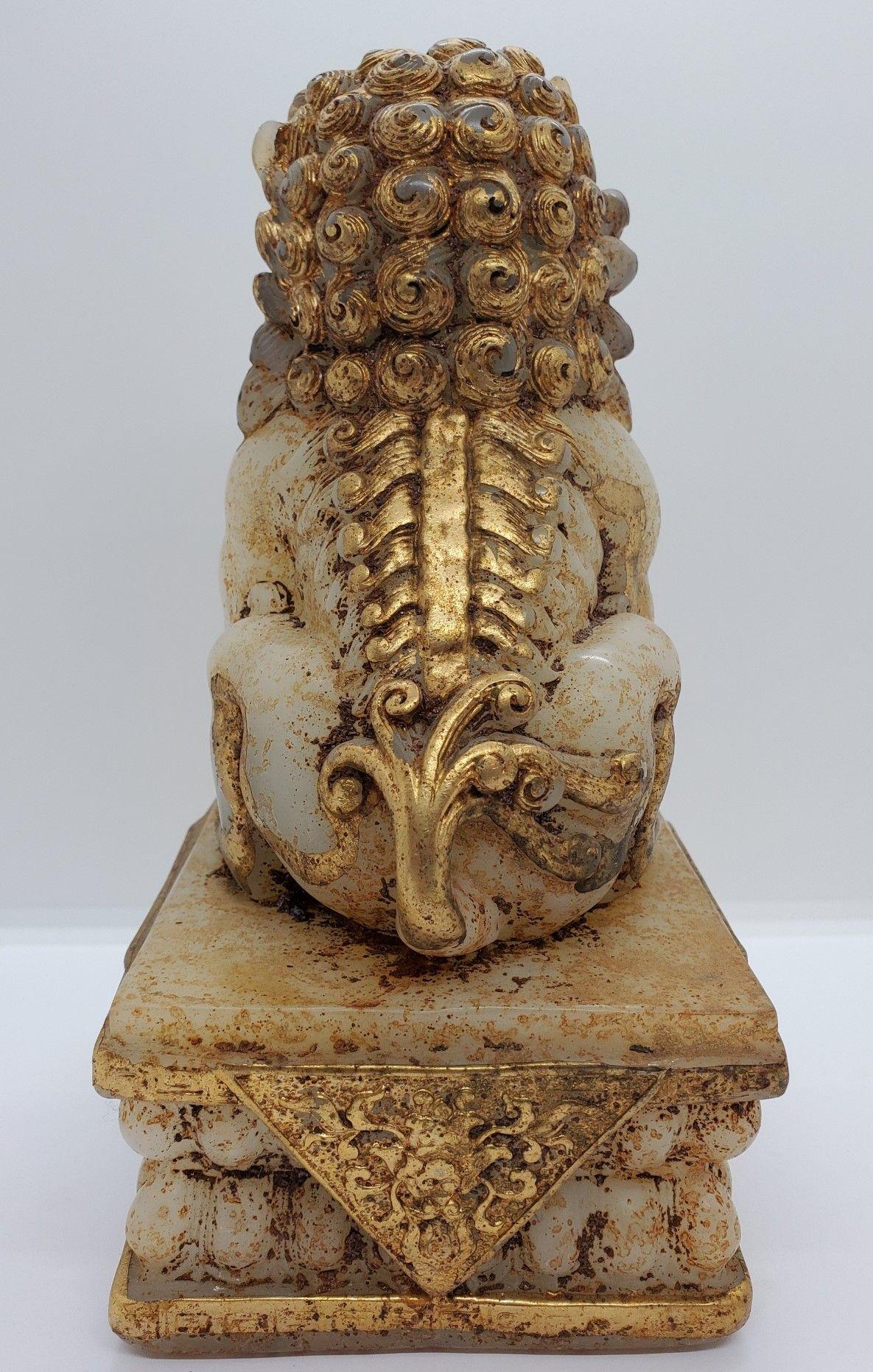 Chinese Early 20th Century Gilded Stone Foo Dog For Sale