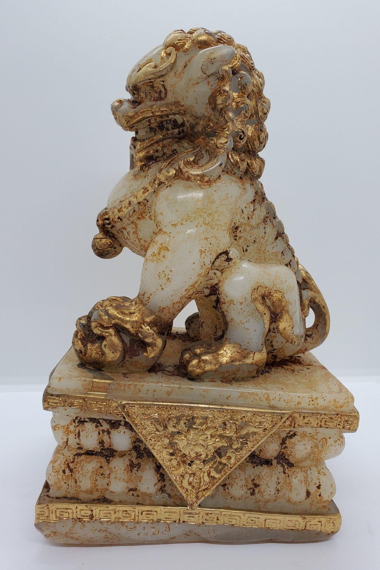 Gilt Early 20th Century Gilded Stone Foo Dog For Sale