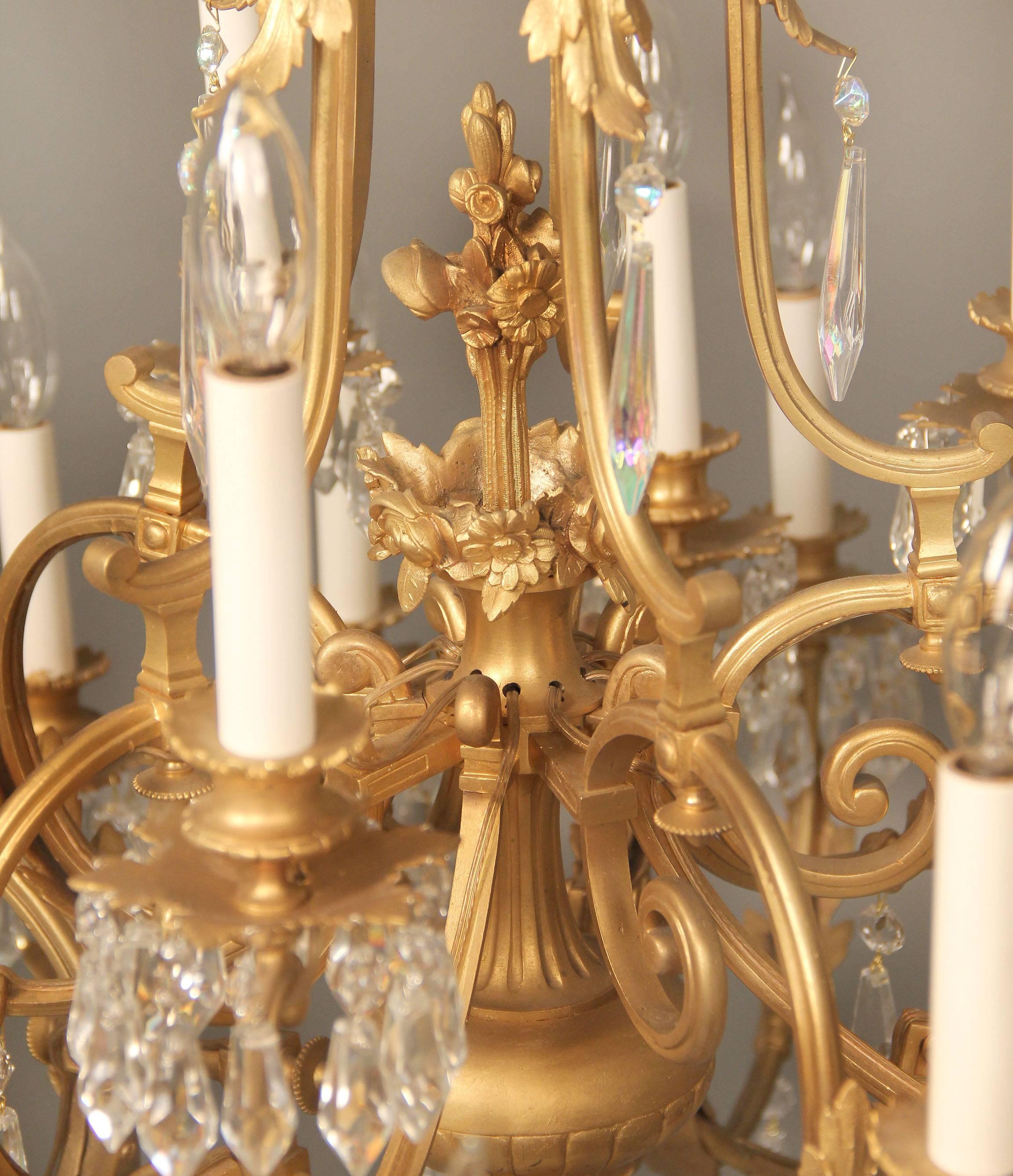 Early 20th Century Gilt Bronze and Drop Crystal Twenty Five Light Chandelier In Good Condition For Sale In New York, NY