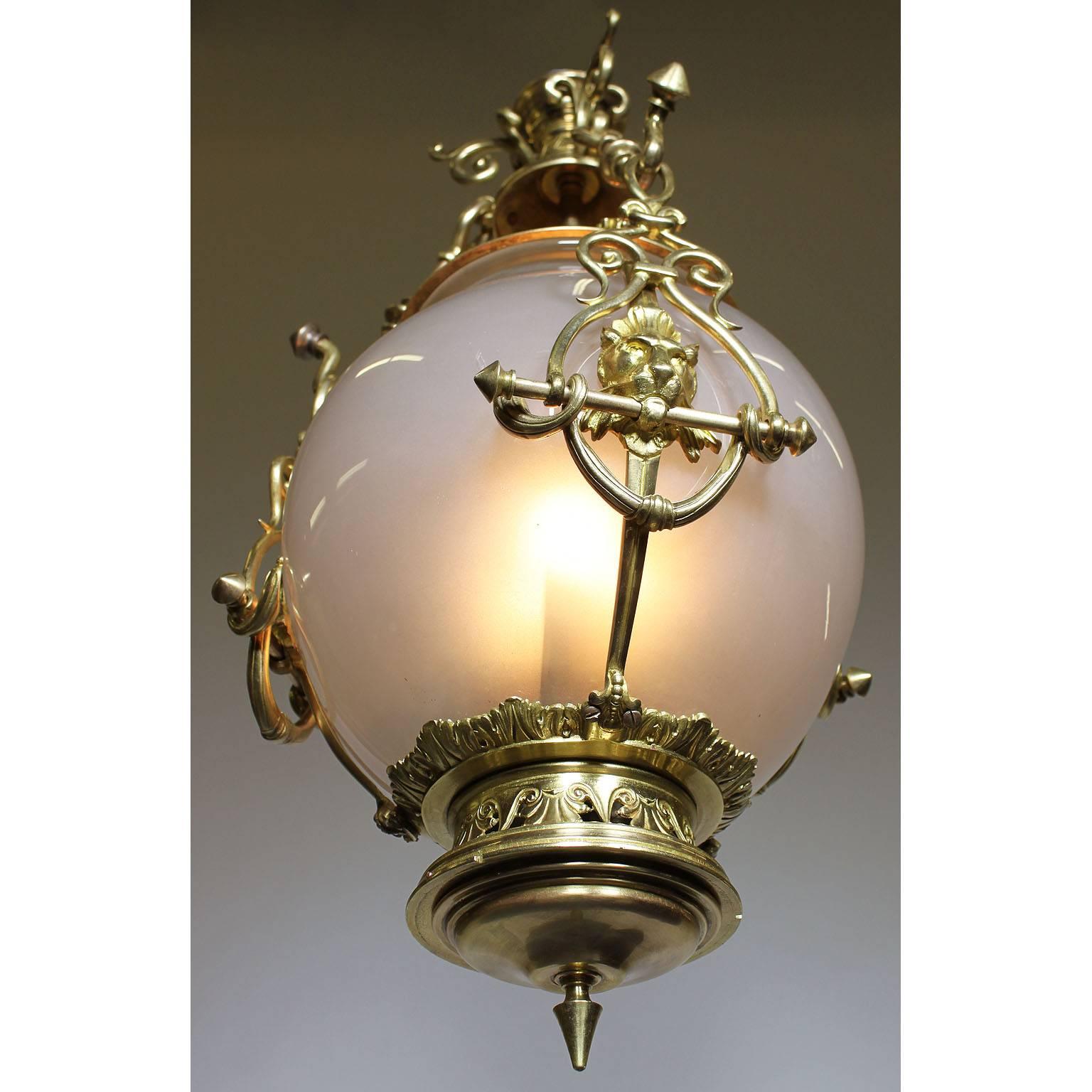 European Early 20th Century Gilt-Bronze and Opaline Glass Hanging Lantern with Lion Pelts For Sale