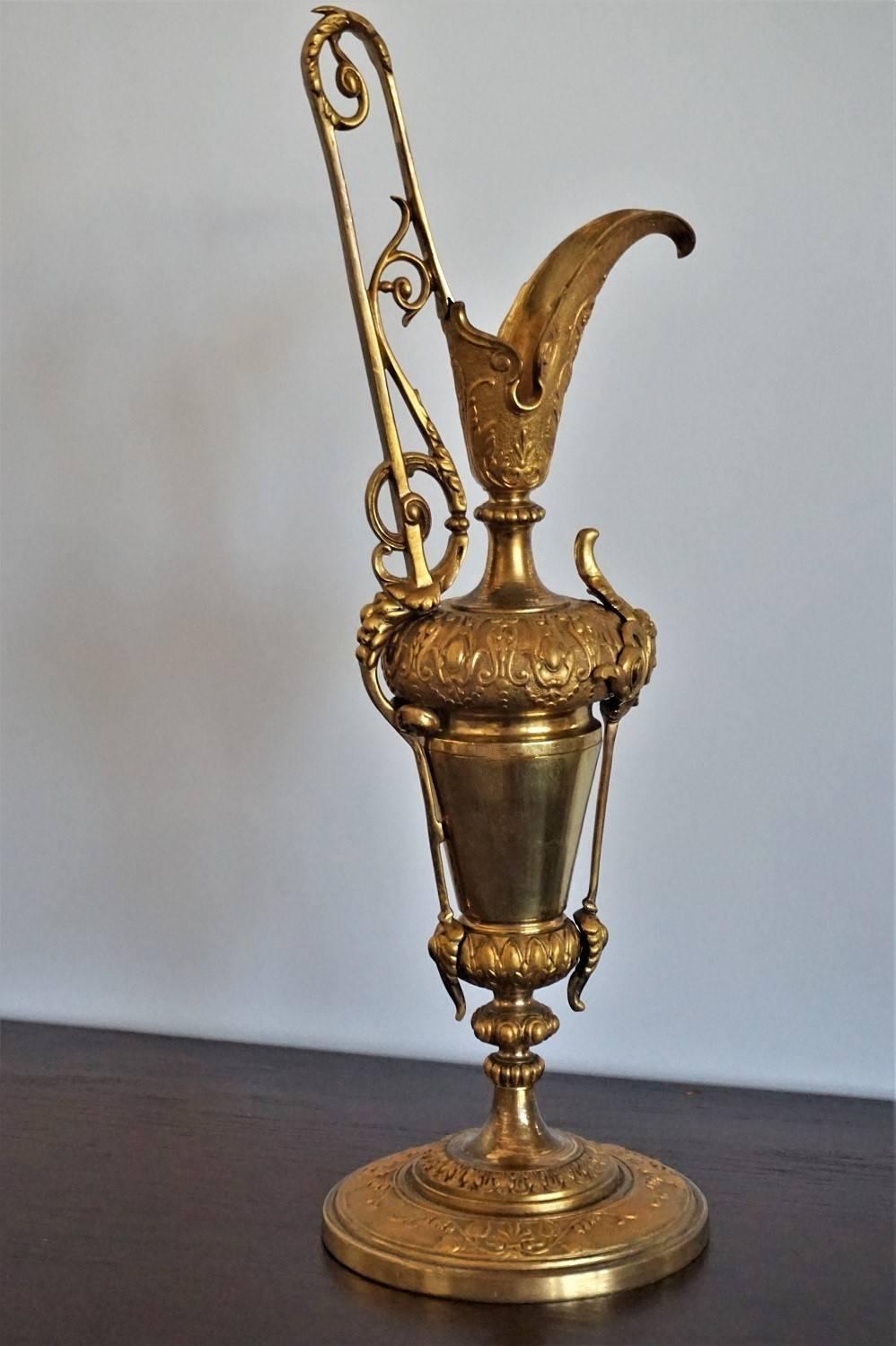 Art Nouveau solid gilt bronze and parcel brass decorative Ewer richly ornate, Spain, circa 1900-1910.

Measures:
Height 15.75 in (40 cm)
Width 5.15 (13 cm)
Depth 5.15 (13 cm).

Very good condition with beautiful patina of age.
