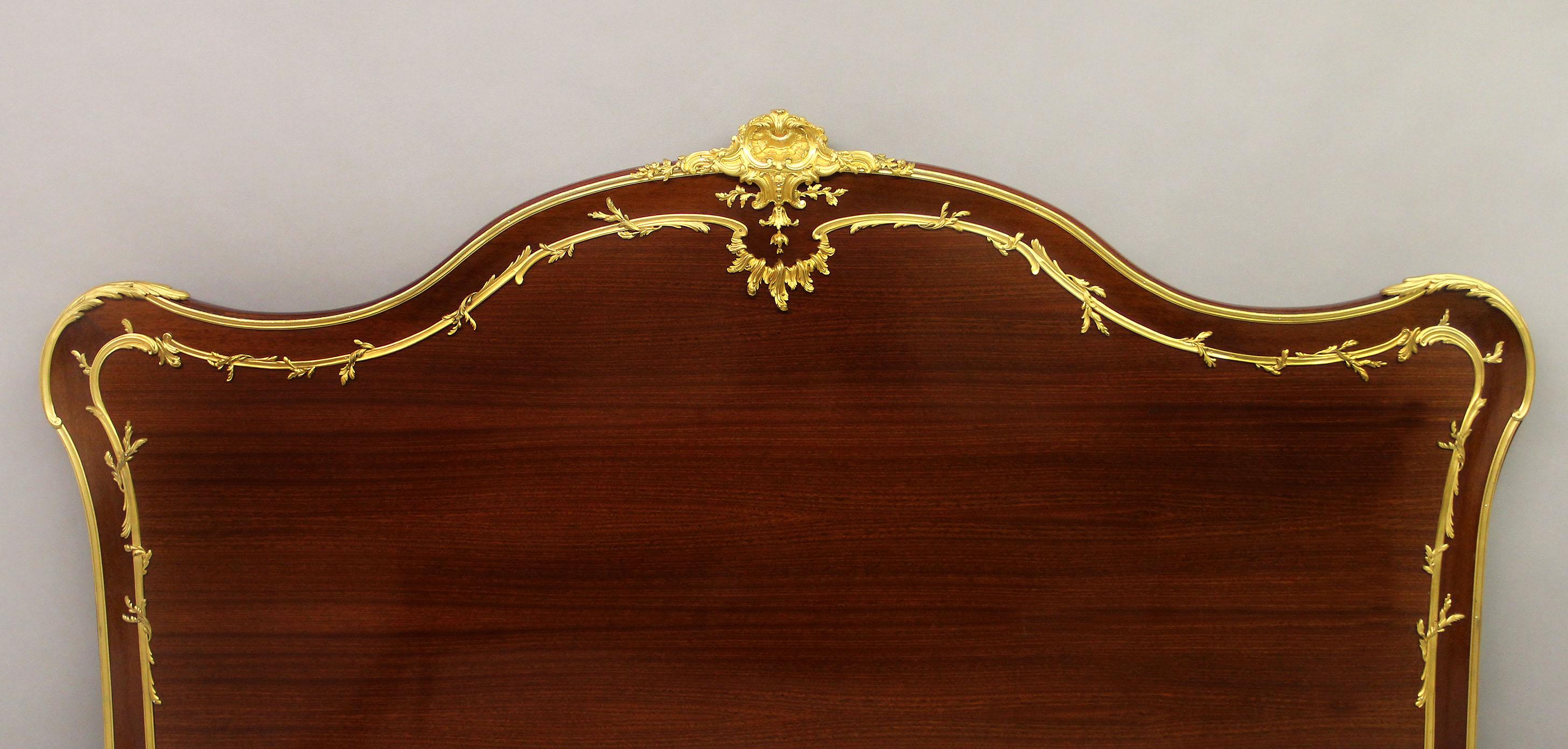 Belle Époque Early 20th Century Gilt Bronze-Mounted Mahogany King Size Bed by François Linke For Sale