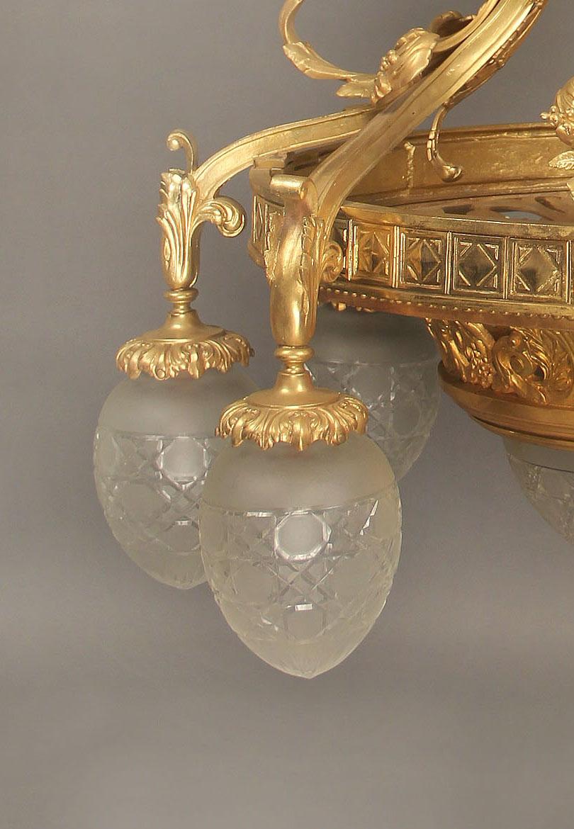 20ième siècle Lustre à dix lumières en bronze doré du début du XXe siècle en vente