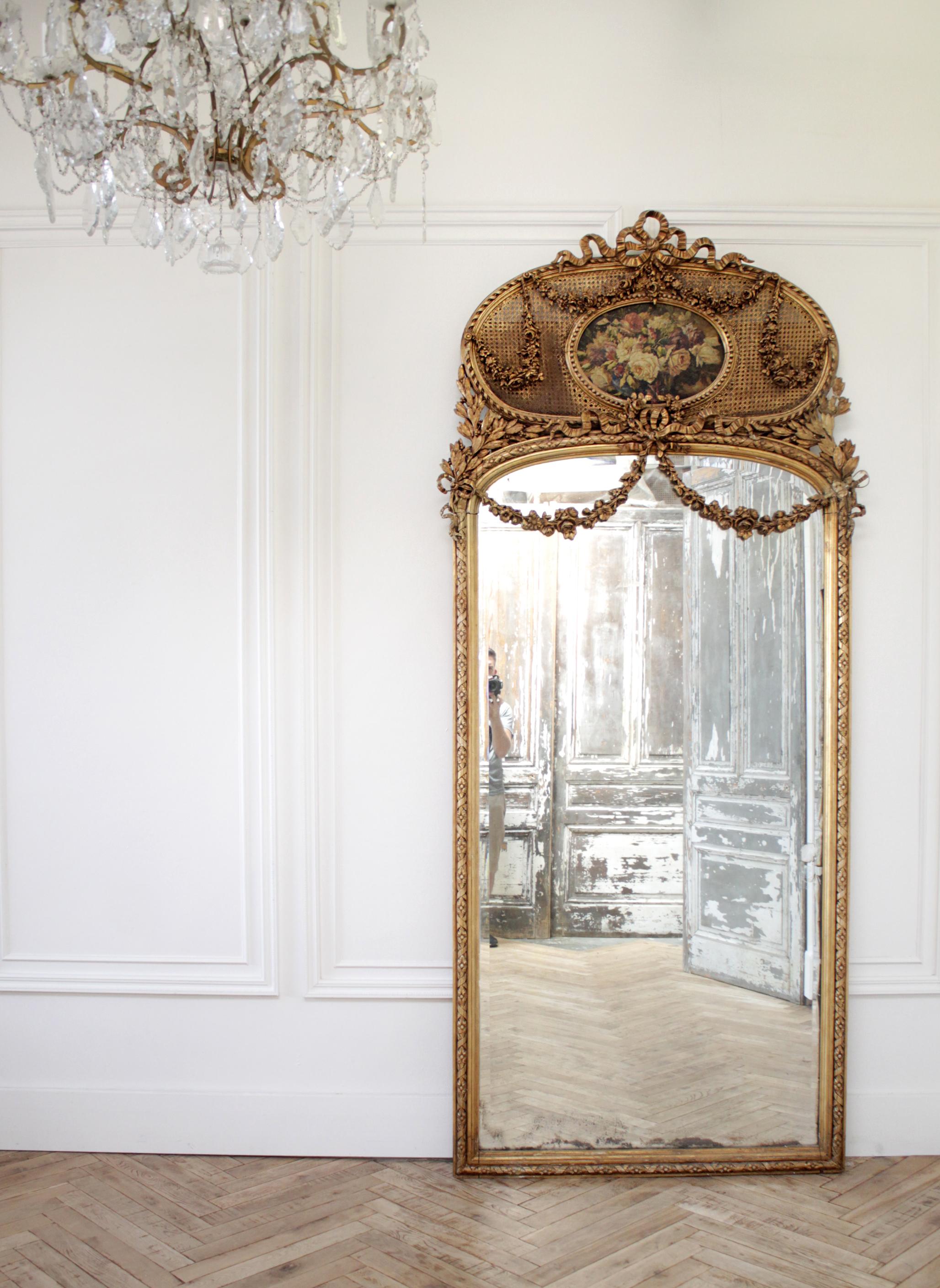 Louis XV Early 20th Century Giltwood Carved Roses and Cane Trumeau Mirror