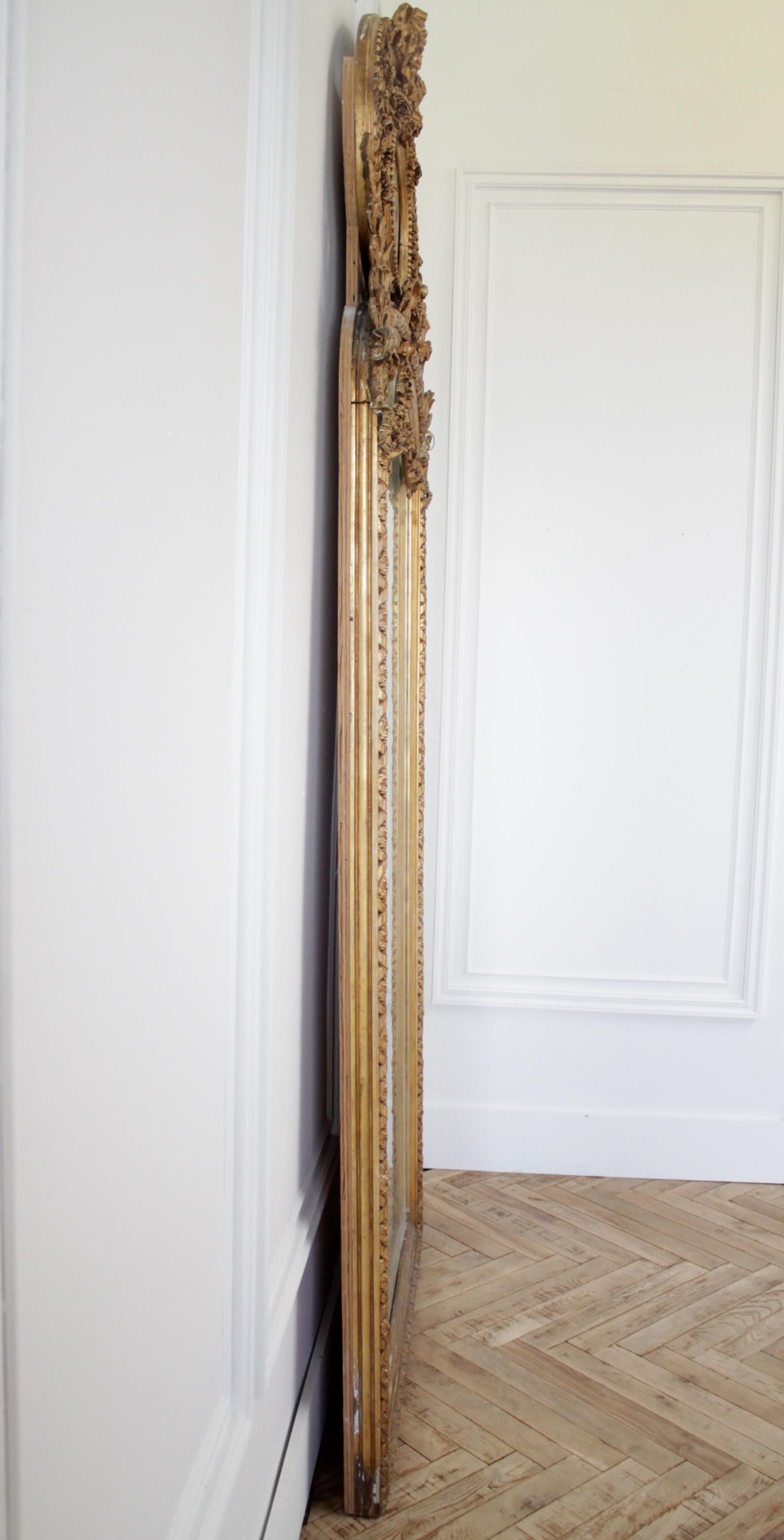 Early 20th Century Giltwood Carved Roses and Cane Trumeau Mirror In Good Condition In Brea, CA