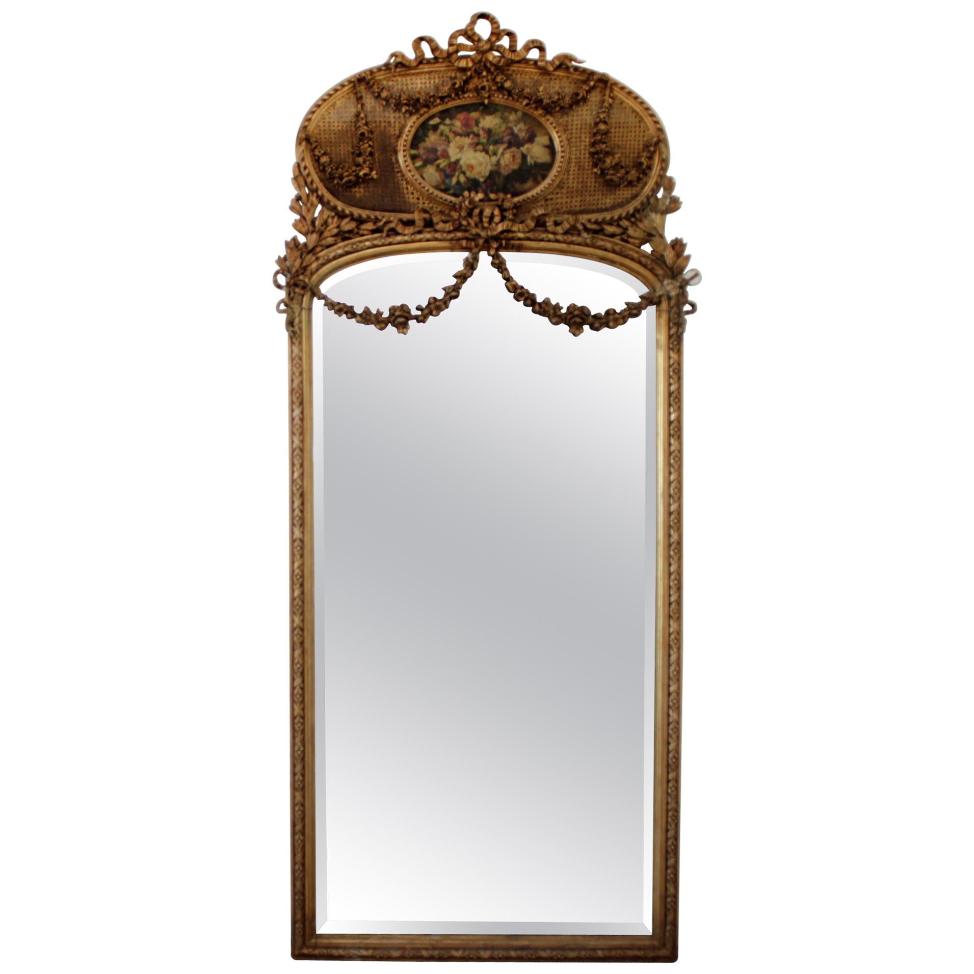 Early 20th Century Giltwood Carved Roses and Cane Trumeau Mirror