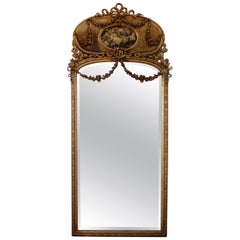 Early 20th Century Giltwood Carved Roses and Cane Trumeau Mirror