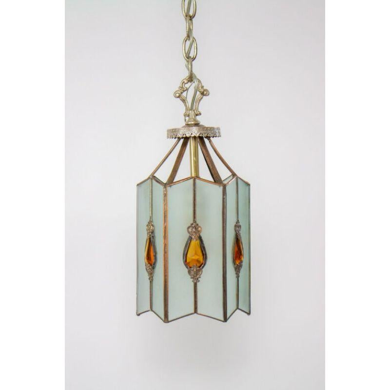 Hexagonal Lantern, Frosted glass panels with amber crystal jewels. Metals are silver plated. Complete with original matching canopy. Lantern only is 14? tall.

Material: Silver,Glass
Style: Art Deco,Traditional
Place of Origin: United