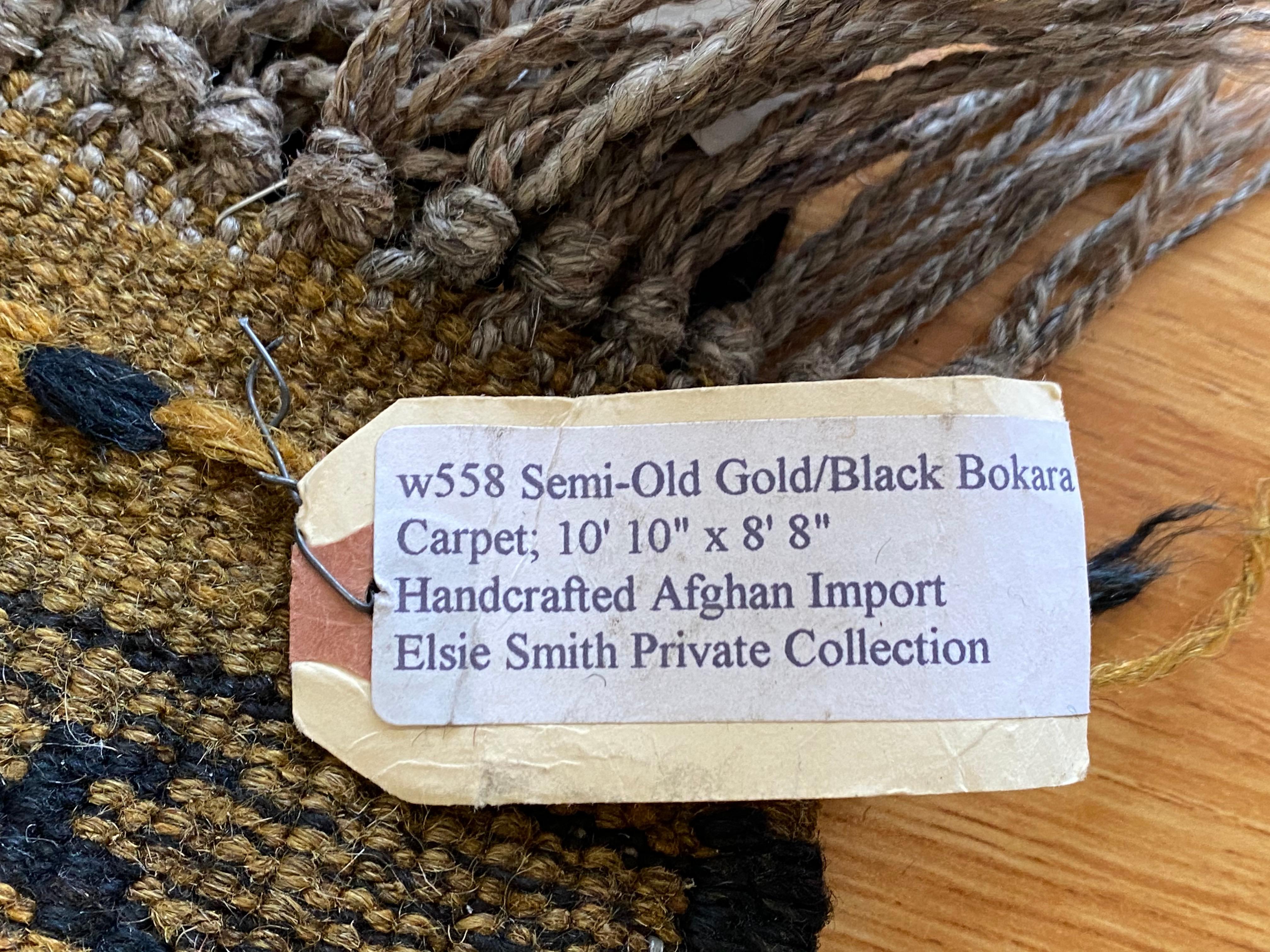 Early 20th Century Gold and Black Bokara Afghan Rug For Sale 6