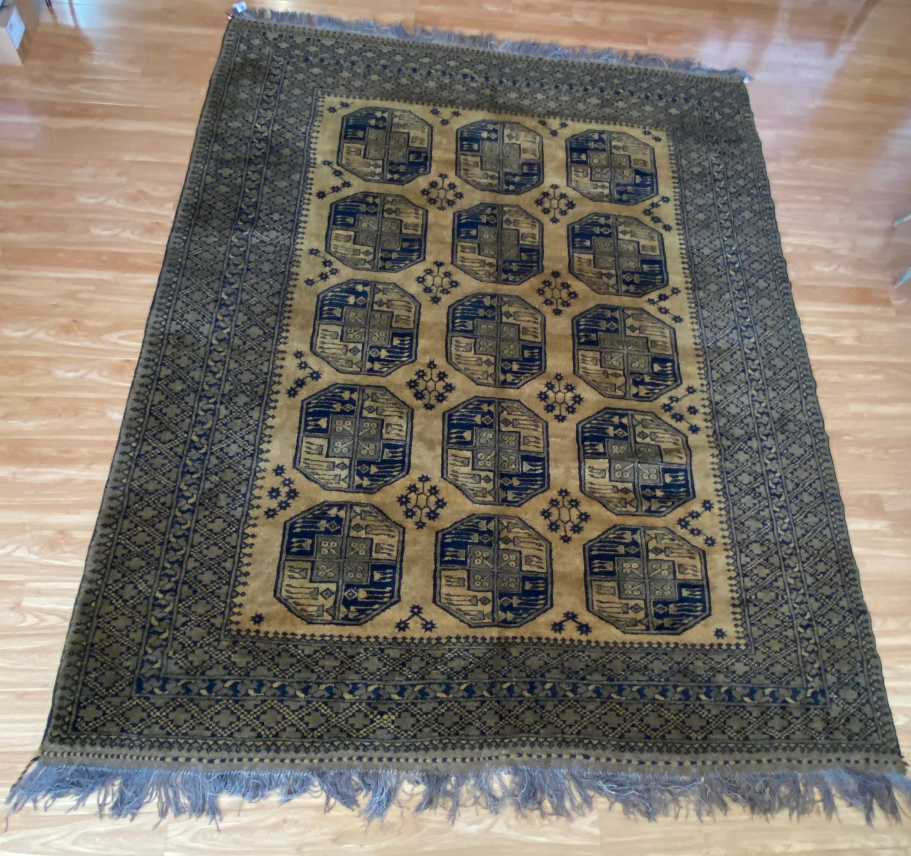 Early 20th century gold and black Bokara Afghan 10 x 8 rug.

Gorgeous rug approximately 50 - 80 years old

We are unsure of the materials used

Provenance Elsie Smith Private Collection

10 feet 8 inches by 8 feet 8 inches

Good condition.