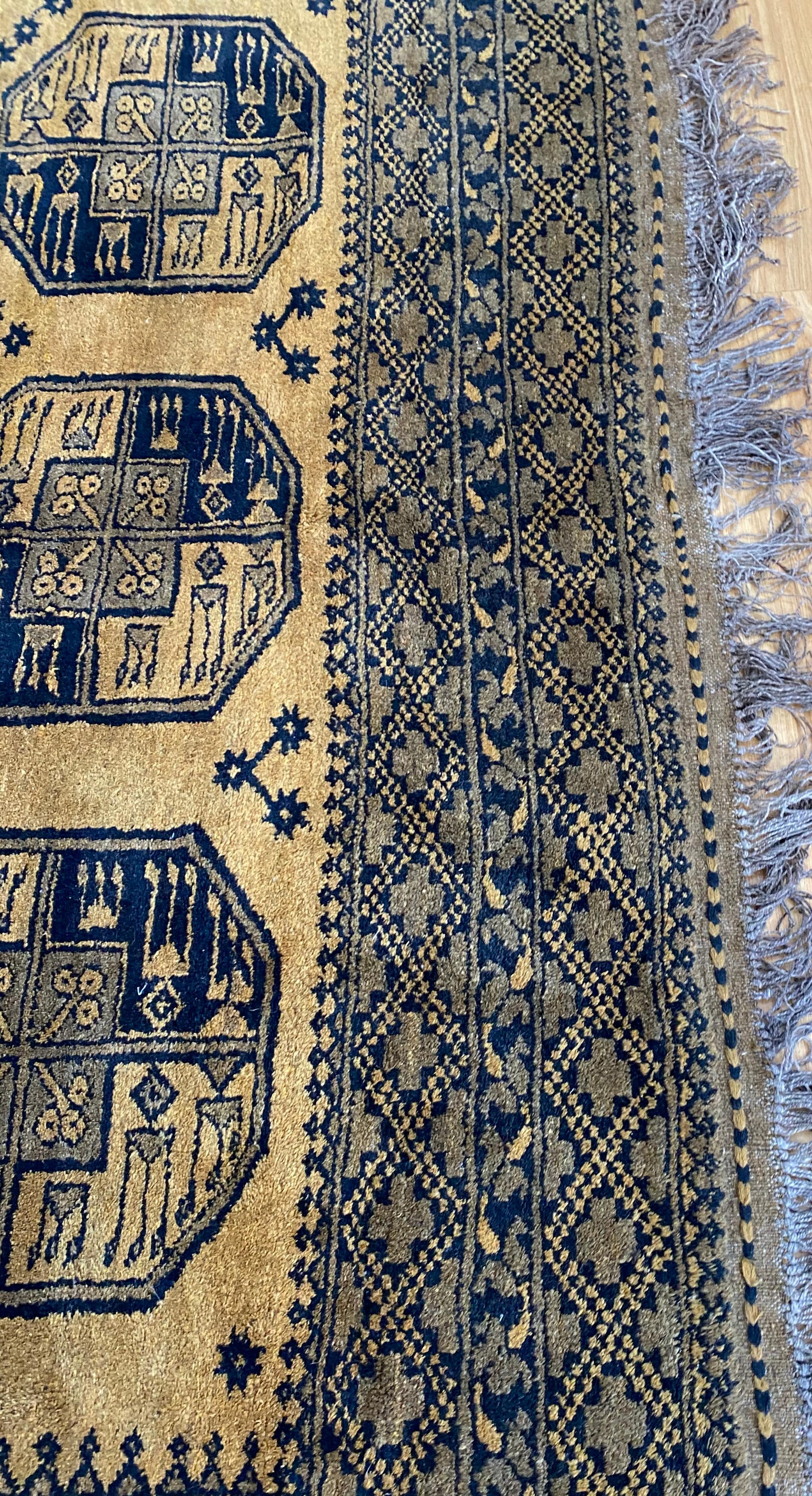 Early 20th Century Gold and Black Bokara Afghan Rug For Sale 2