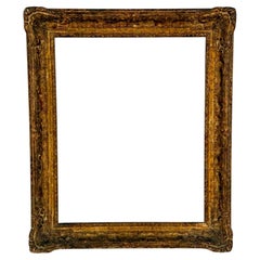Marco rectangular de madera dorada de principios del siglo XX