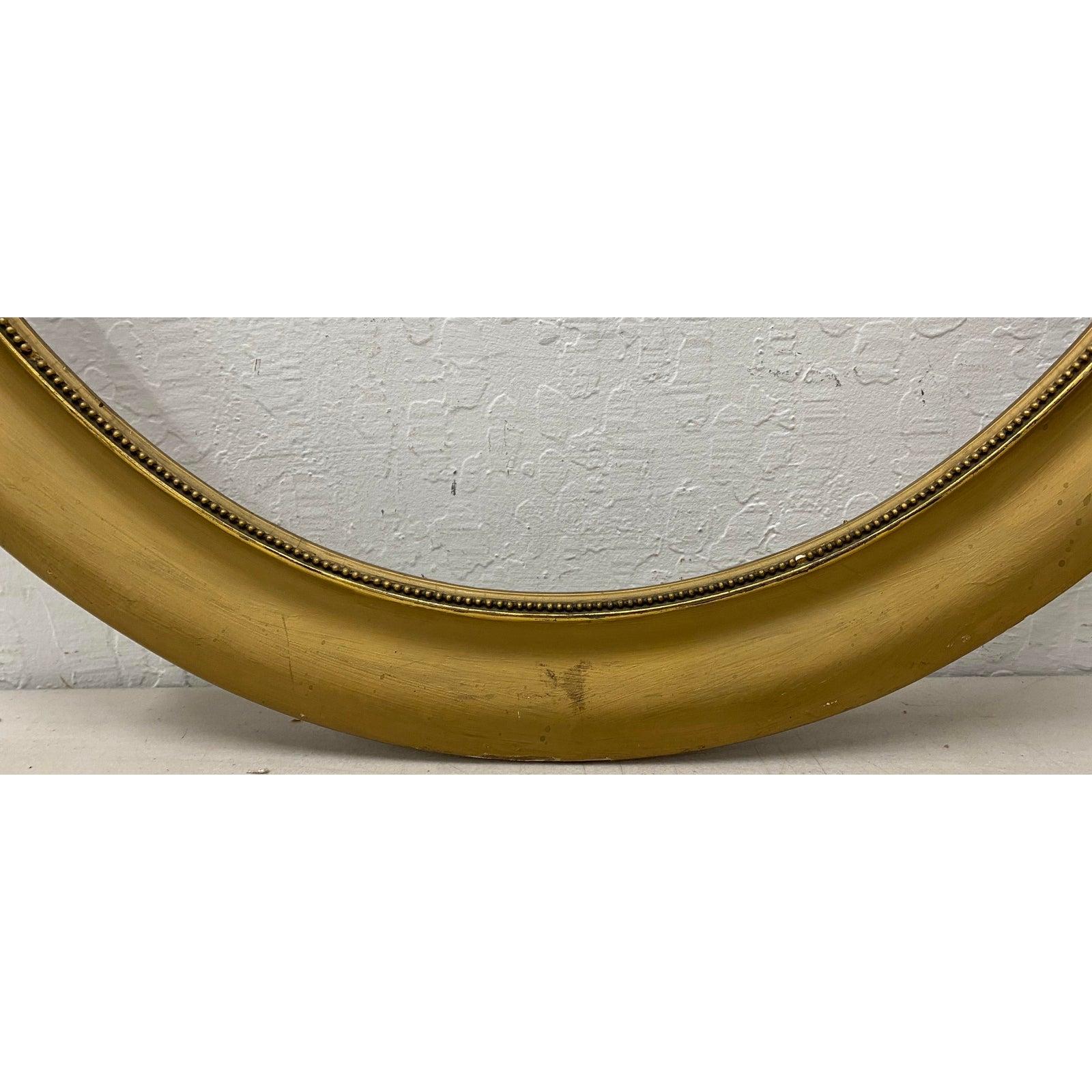 Early 20th century gold painted oval frame

Measures: Opening 21