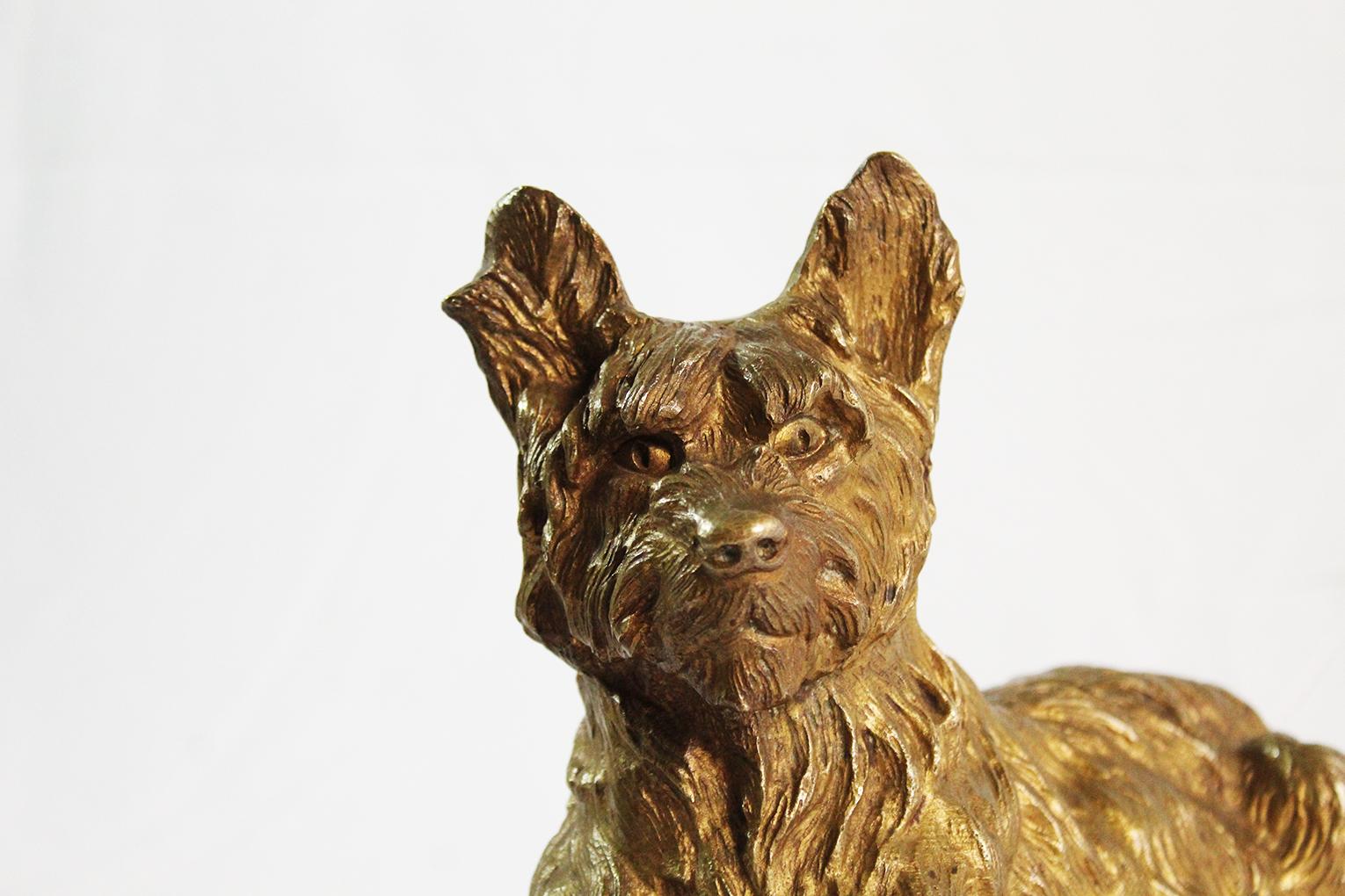 This antique bronze figure was sculpted in France. The sculpture is a dog on a black marble base. This figure is signed on the front by TH Cartier. It would be a nice desk accessory or a piece for a library.

Thomas François Cartier (1879-1943)