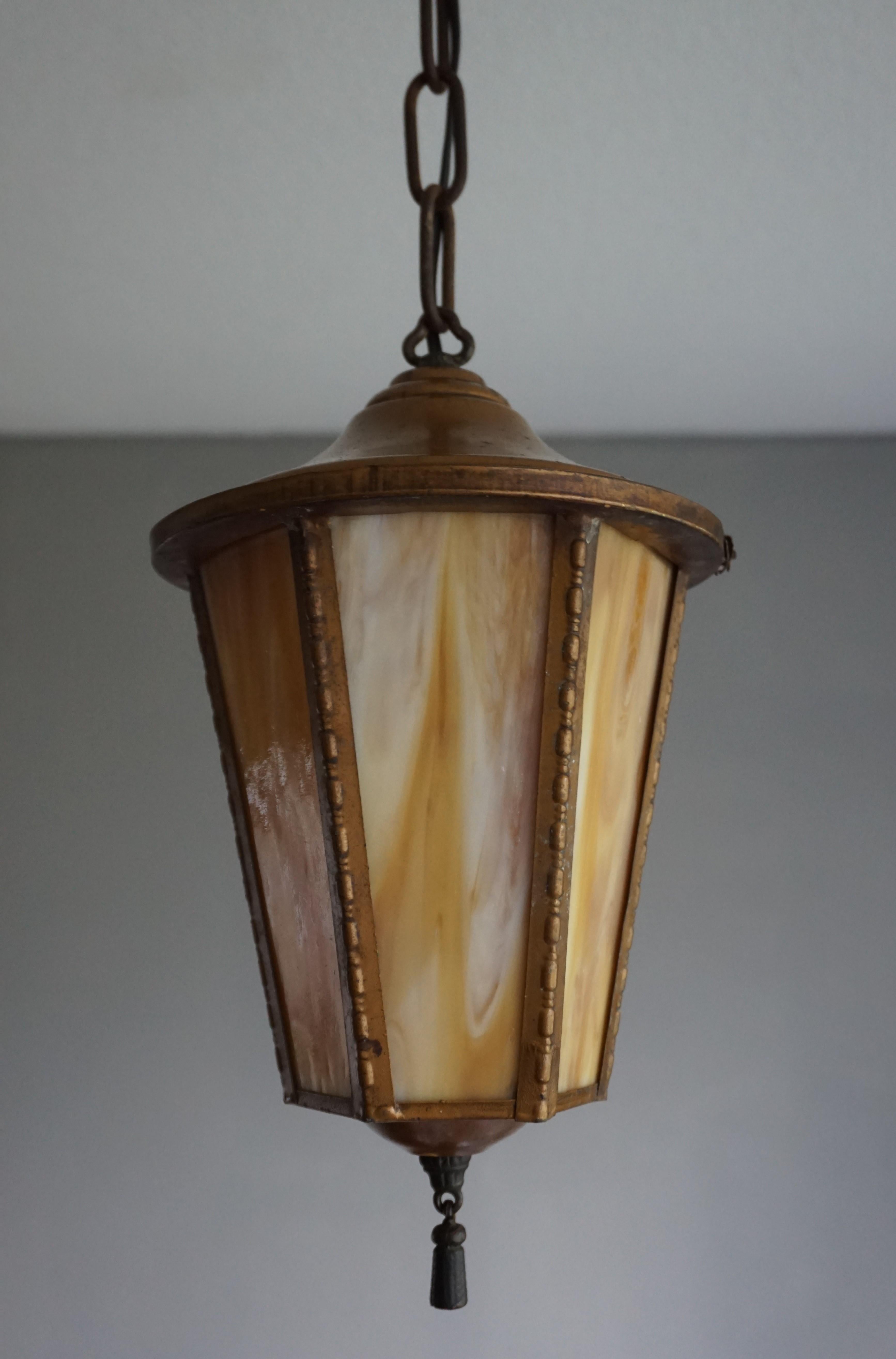 Blackened Early 1900s Golden Brown Metal & Tiffany Glass Church Entrance Pendant Light For Sale
