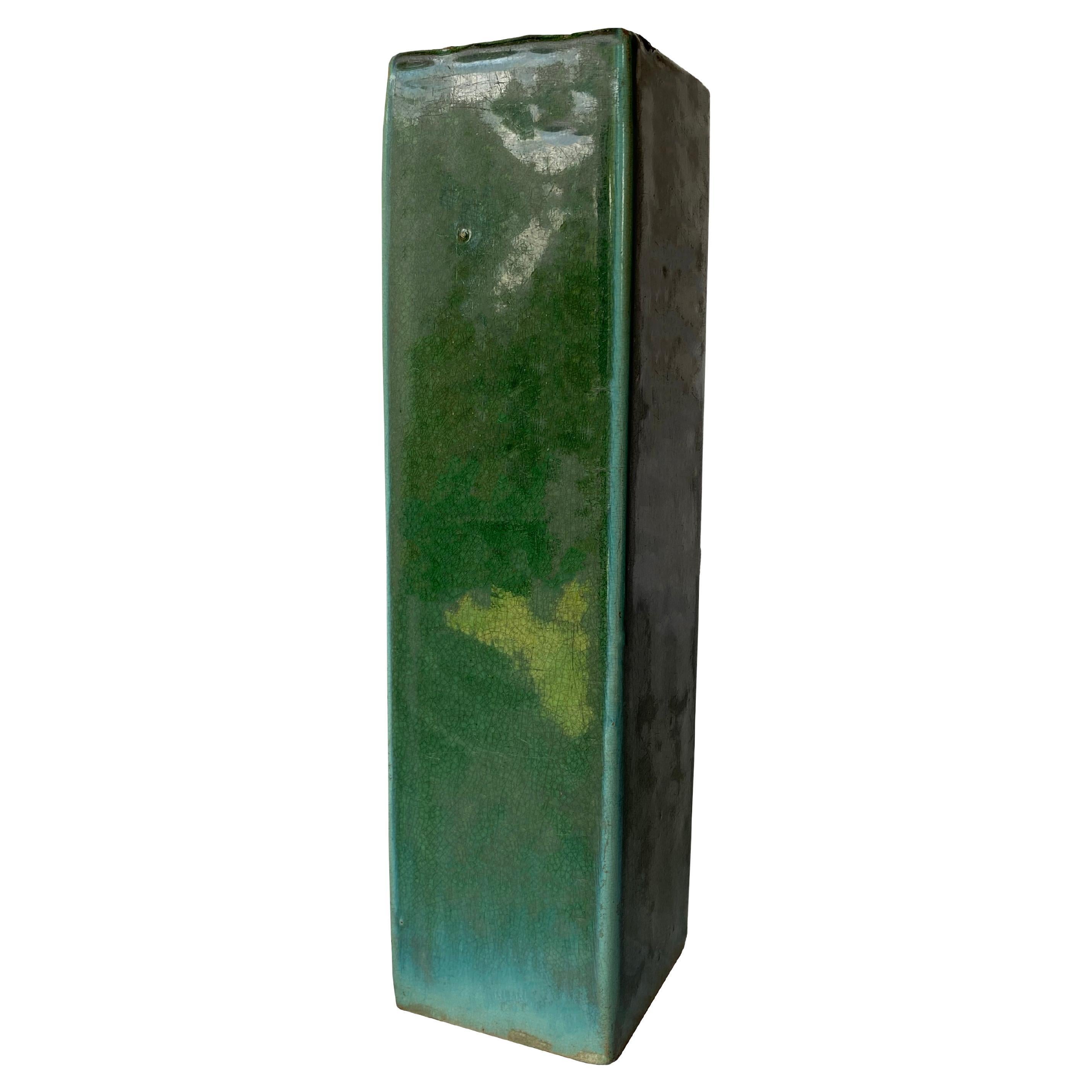 Cuscino da oppio cinese in ceramica verde smaltata 'Shiwan', inizio XX secolo