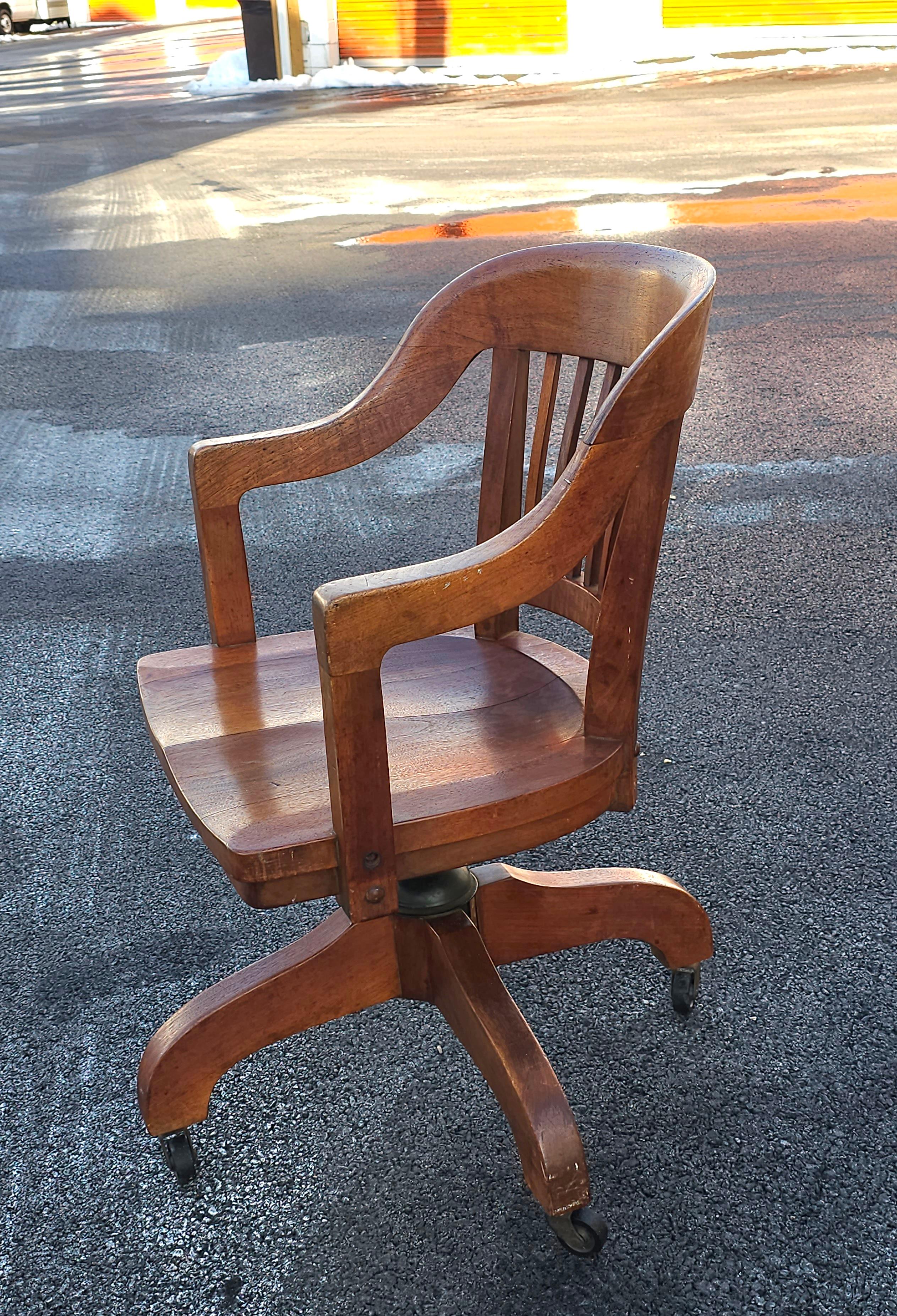 Other Early 20th Century Gunlocke Oak Rolling and Tilting Banker's Chair For Sale