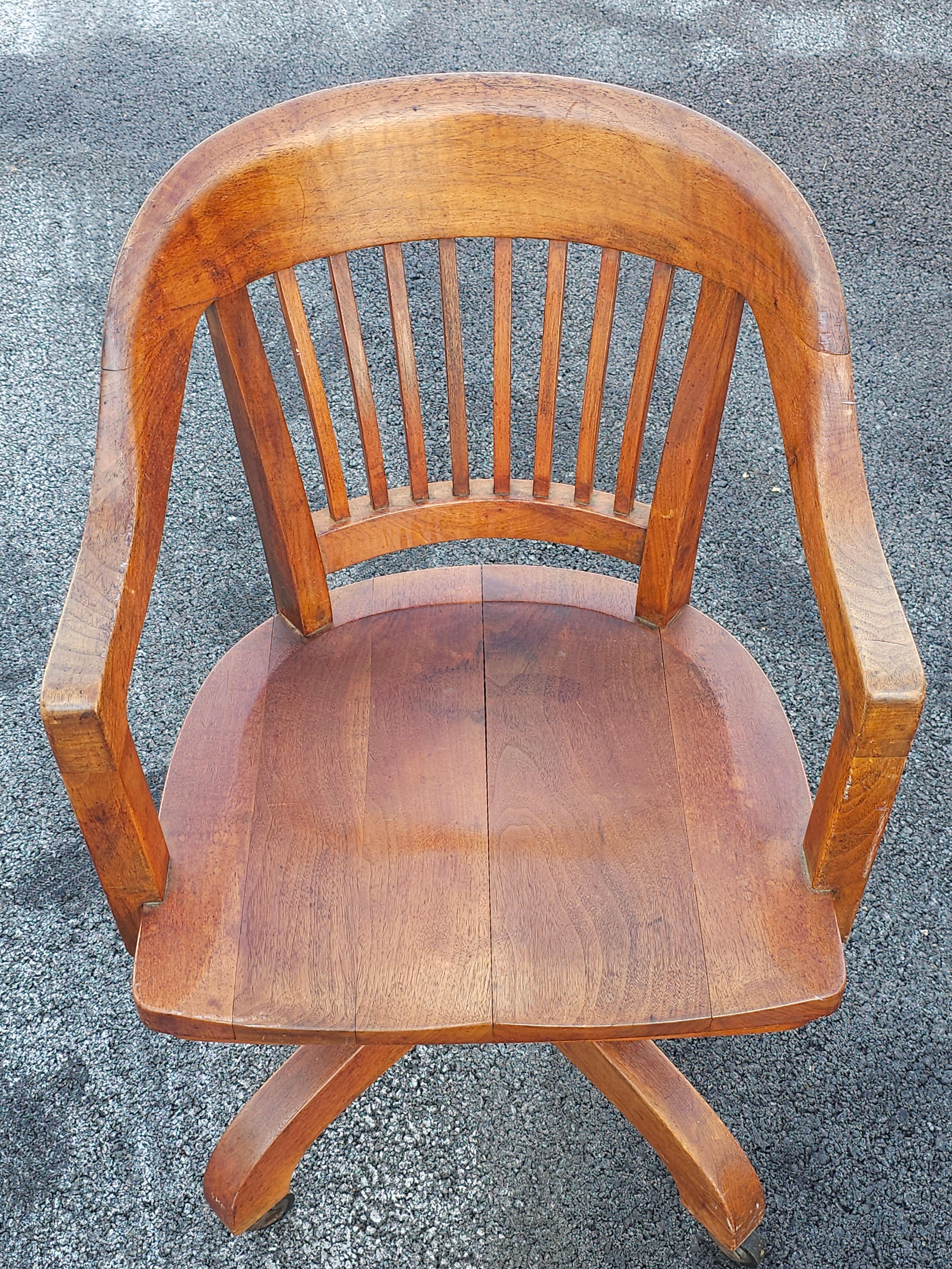 Cut Steel Early 20th Century Gunlocke Oak Rolling and Tilting Banker's Chair For Sale