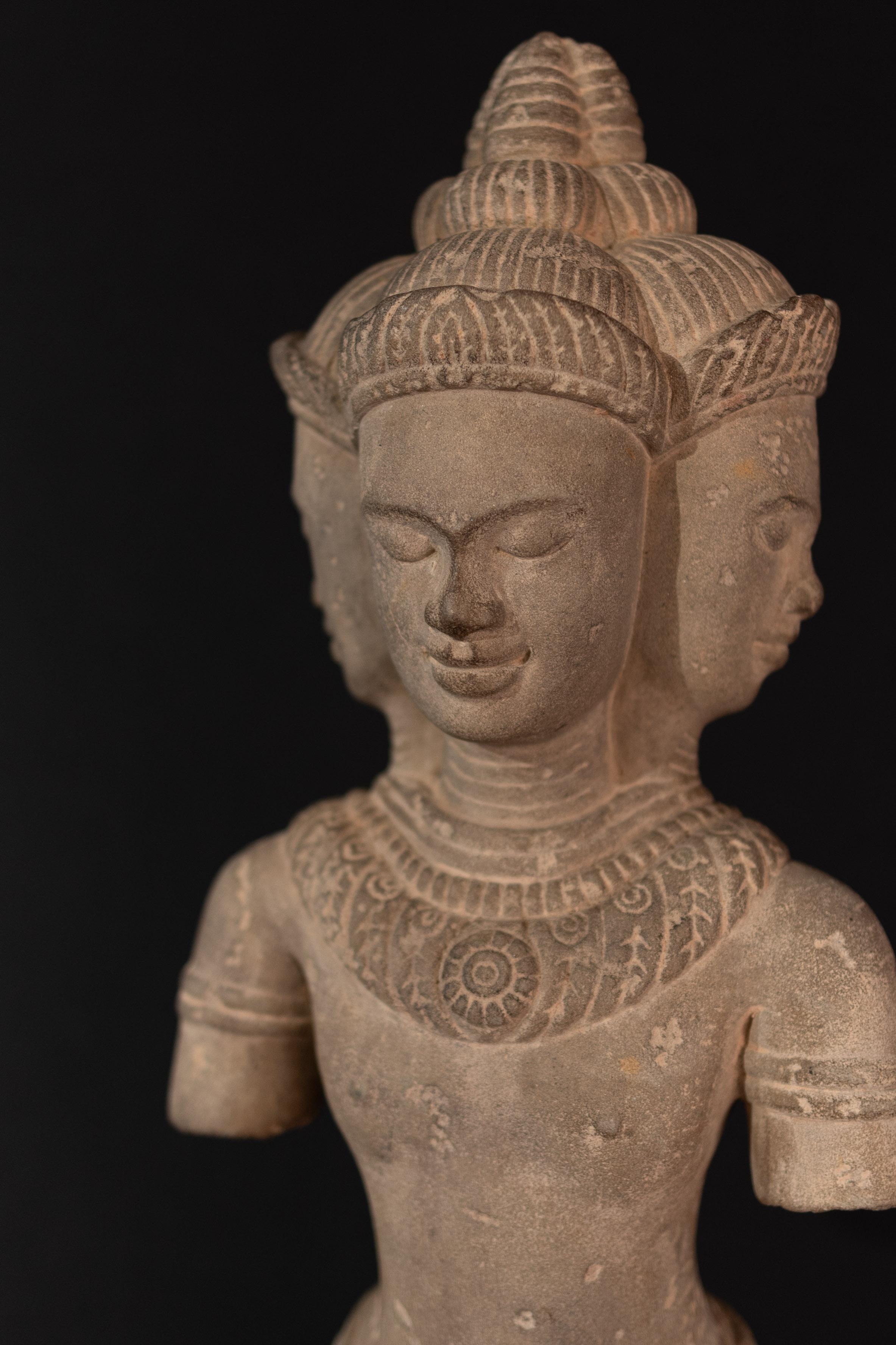 Limestone Early 20th century hand-carved 4 heads sculpture from Cambodia For Sale