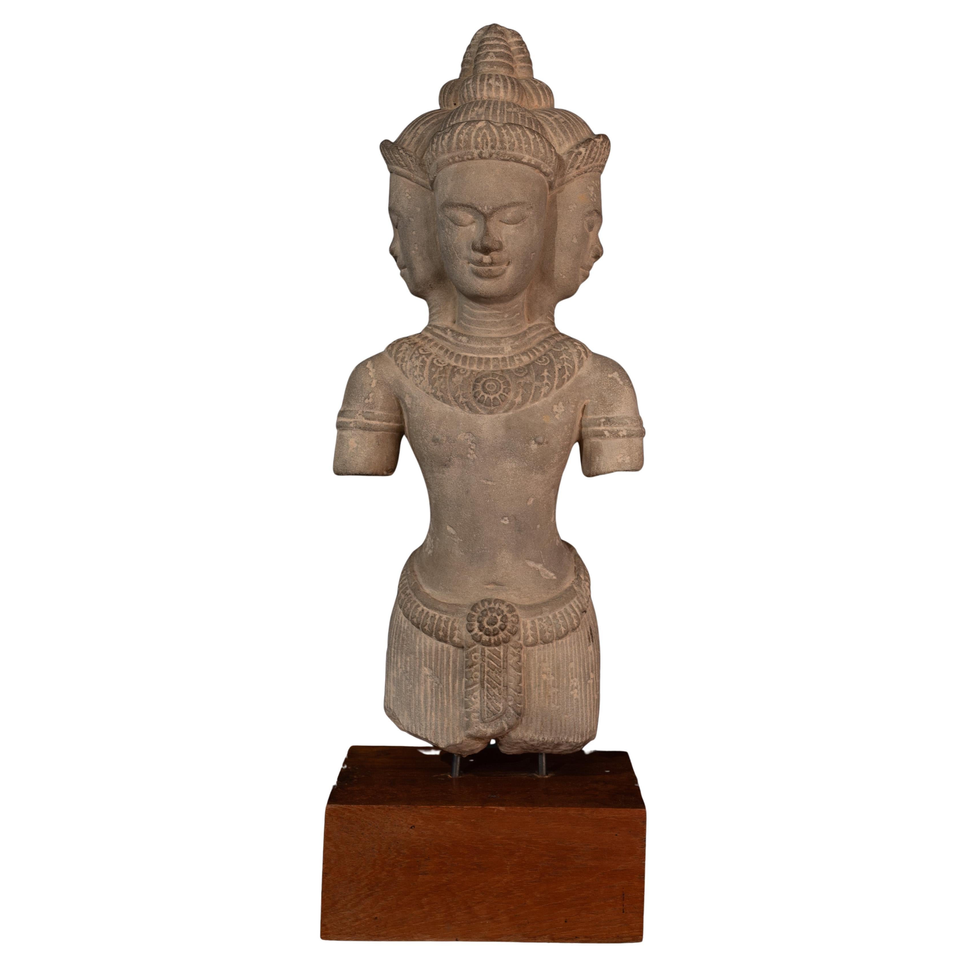 Early 20th century hand-carved 4 heads sculpture from Cambodia For Sale