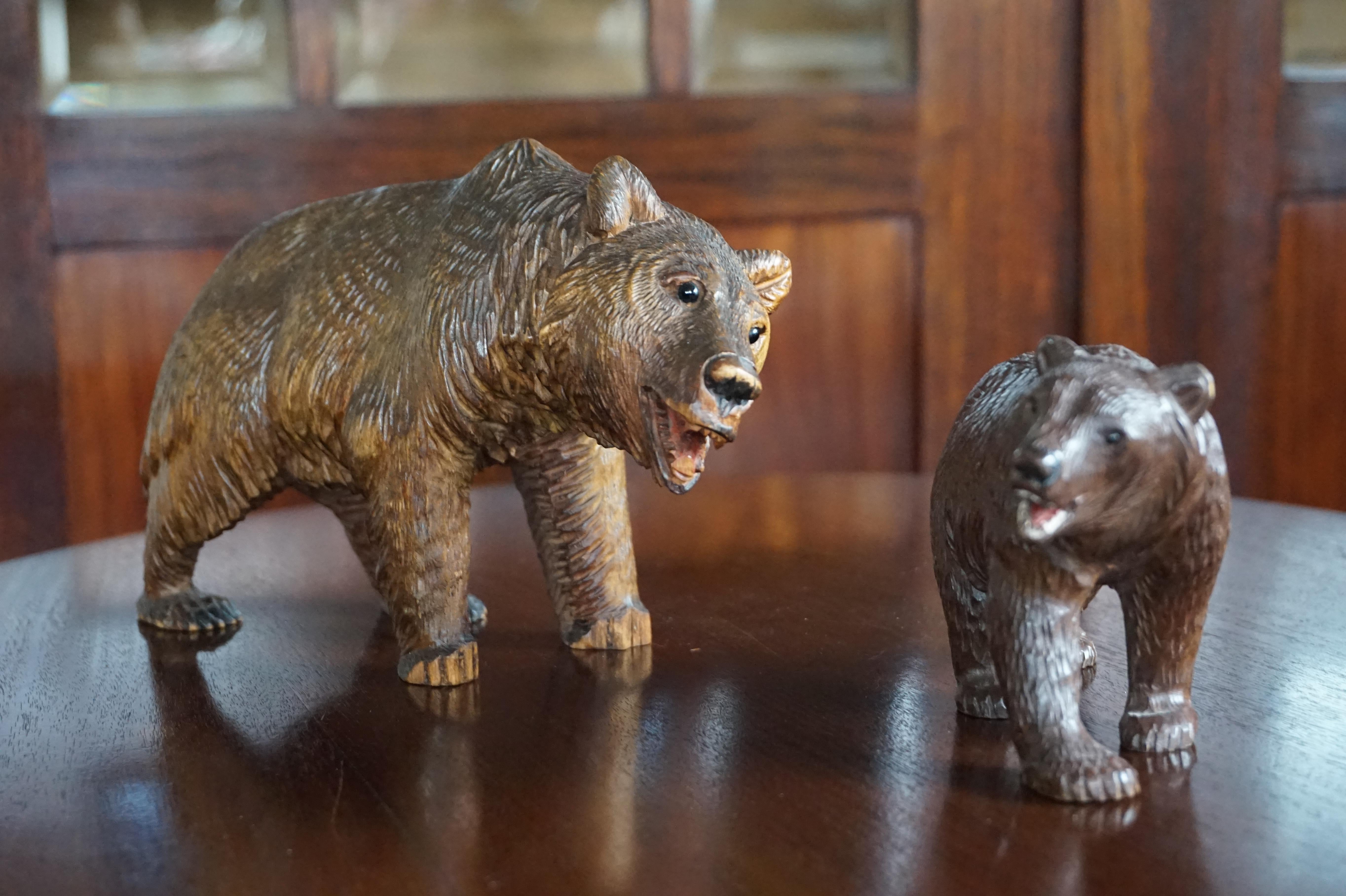 Beautifully carved and highly decorative pair or walking bears.

If you are looking to start a collection or if you are looking for an artistic and original gift for a bear lover then these two could be perfect. Papa bear and junior can be placed
