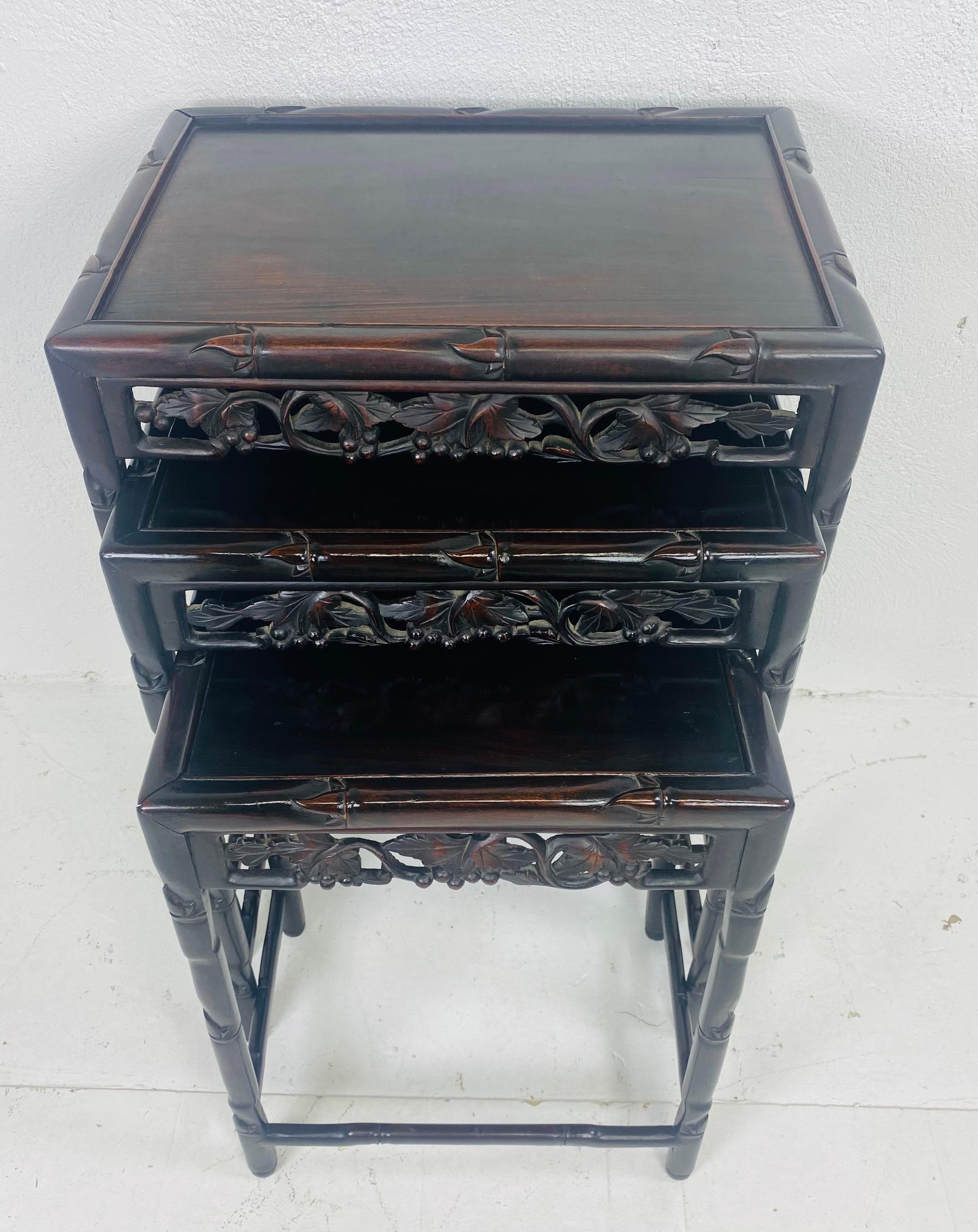 Hand-Carved Early 20th century hand carved Chinese mahogany nest of tables