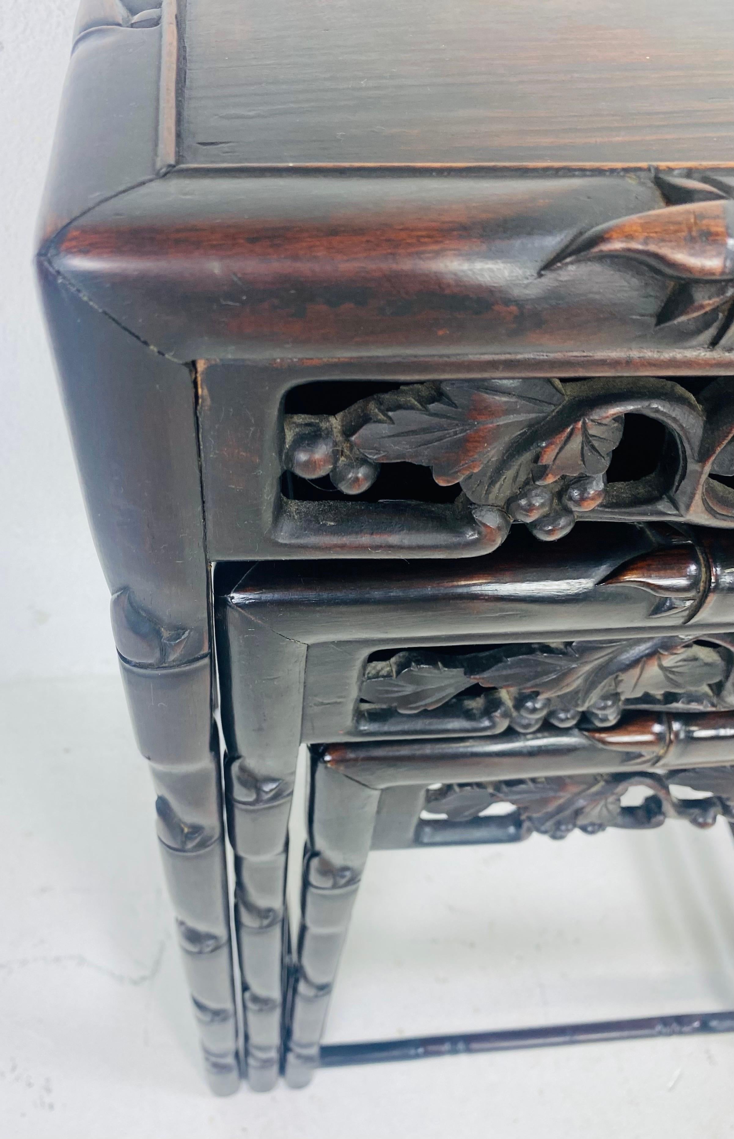 Early 20th century hand carved Chinese mahogany nest of tables In Good Condition In Allentown, PA