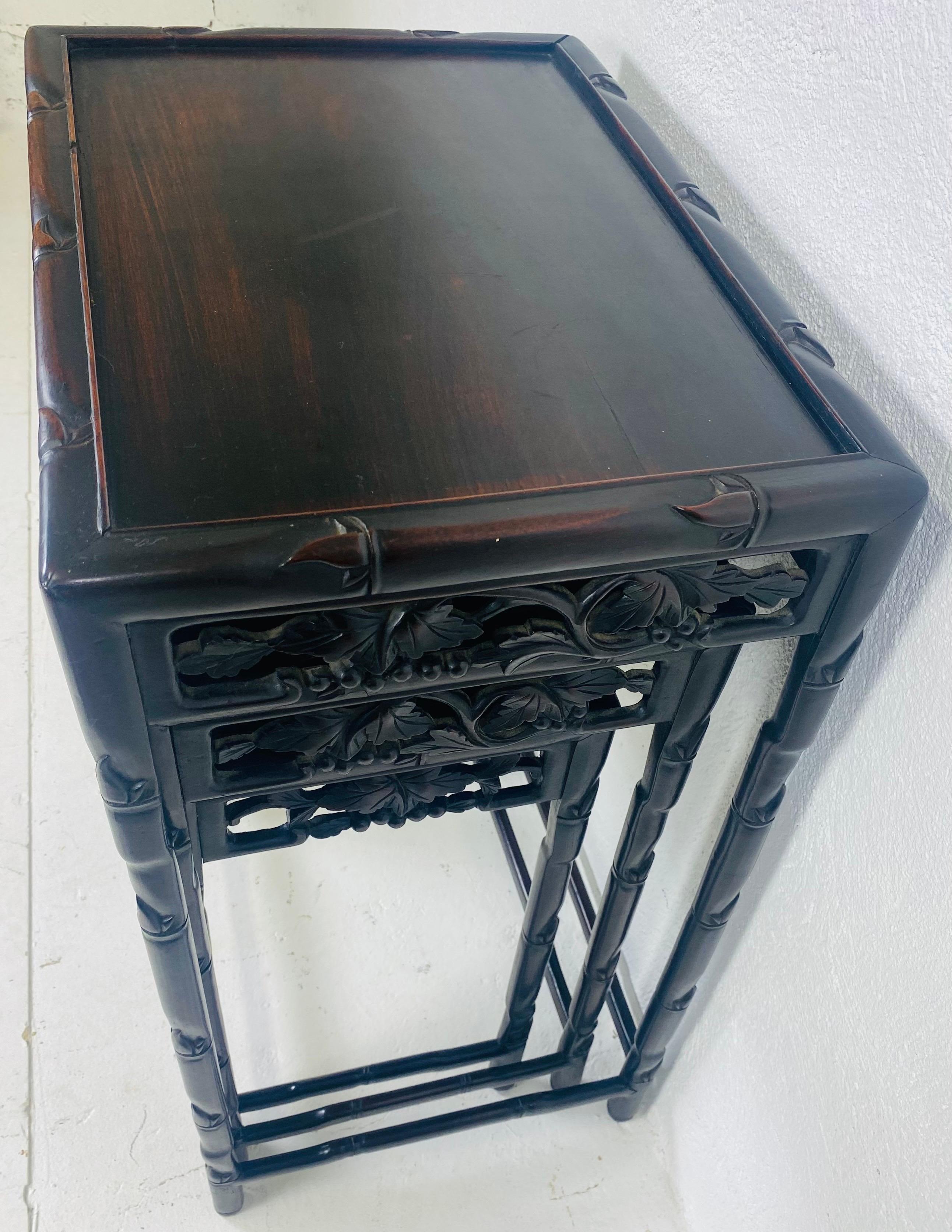 Wood Early 20th century hand carved Chinese mahogany nest of tables