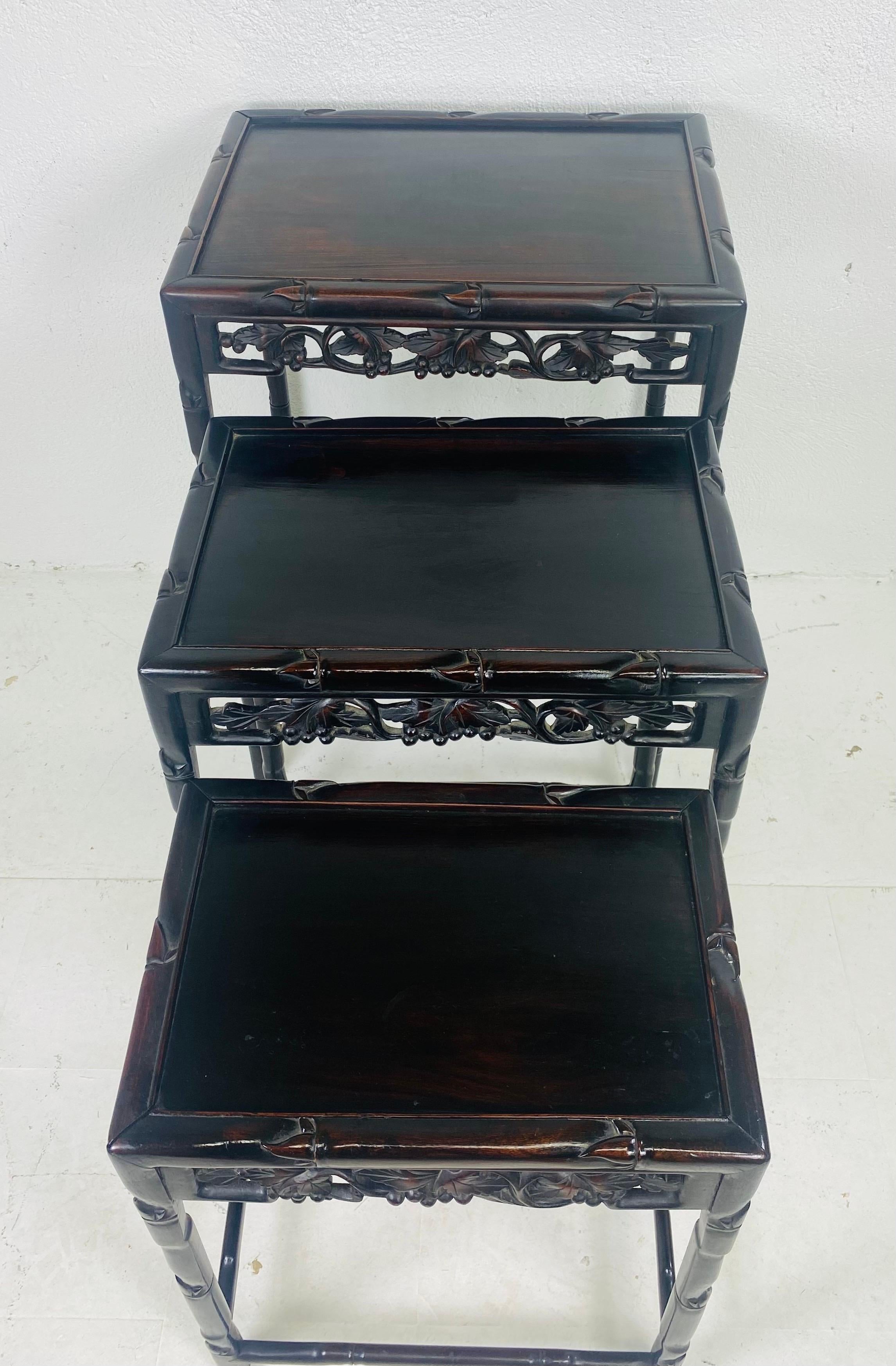 Early 20th century hand carved Chinese mahogany nest of tables 1