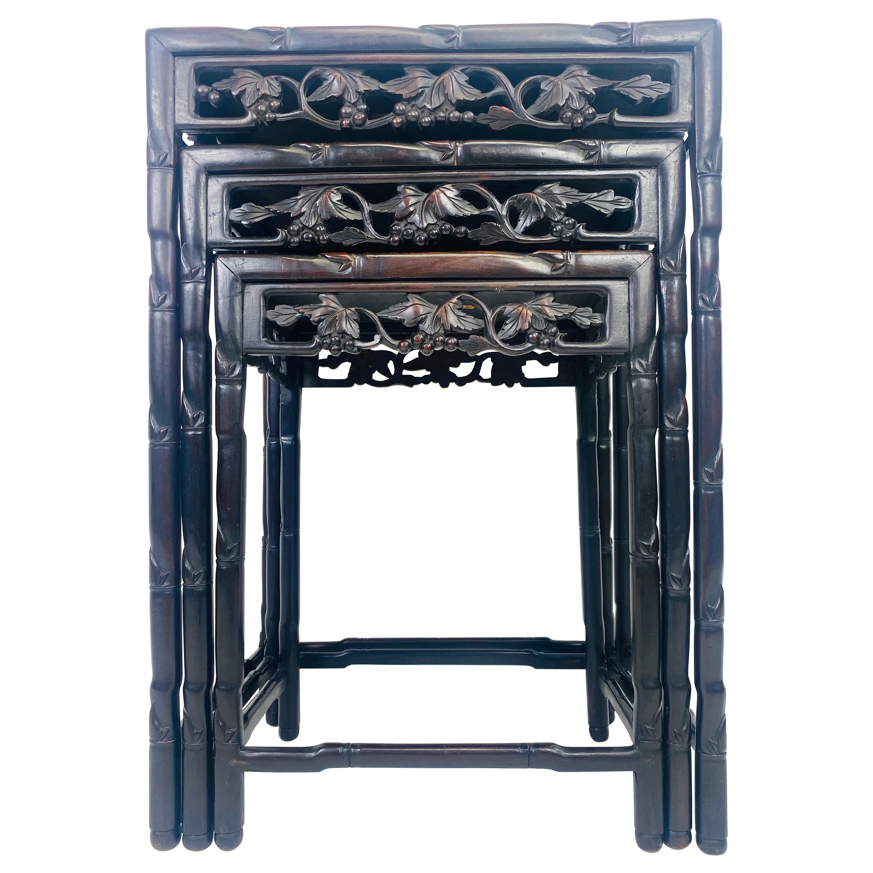 Early 20th century hand carved Chinese mahogany nest of tables
