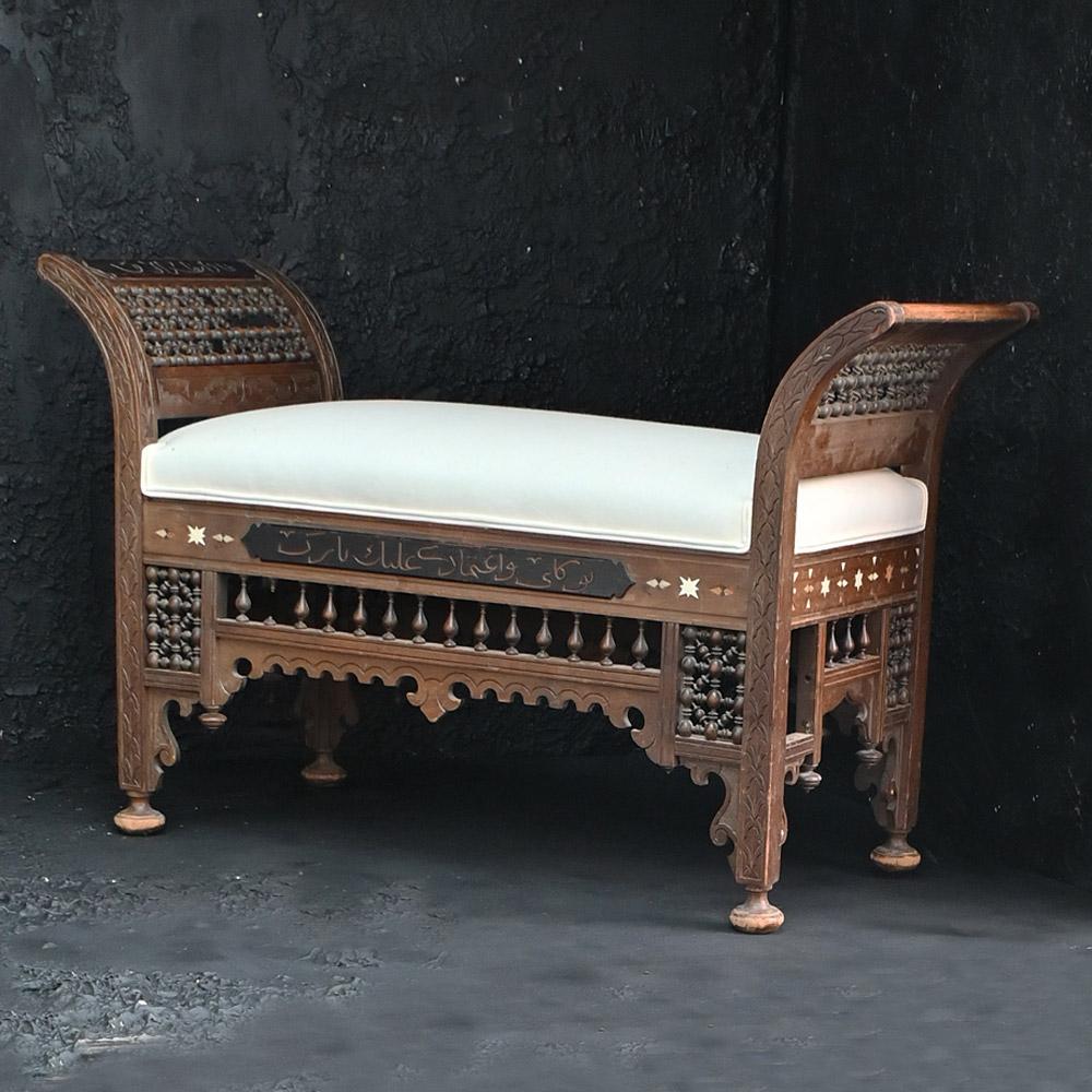 Early 20th Century Hand Carved Islamic Moorish Window Seat  

A good example of an early 20th Century hand carved Islamic Moorish window settle. Recently reupholstered and cushioned for modern day use. This example is of wider form which would fit