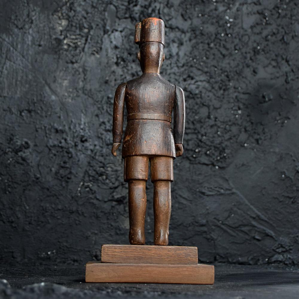 Early 20th Century Hand Carved Naïve Folk-Art Figure of a Soldier In Fair Condition For Sale In London, GB