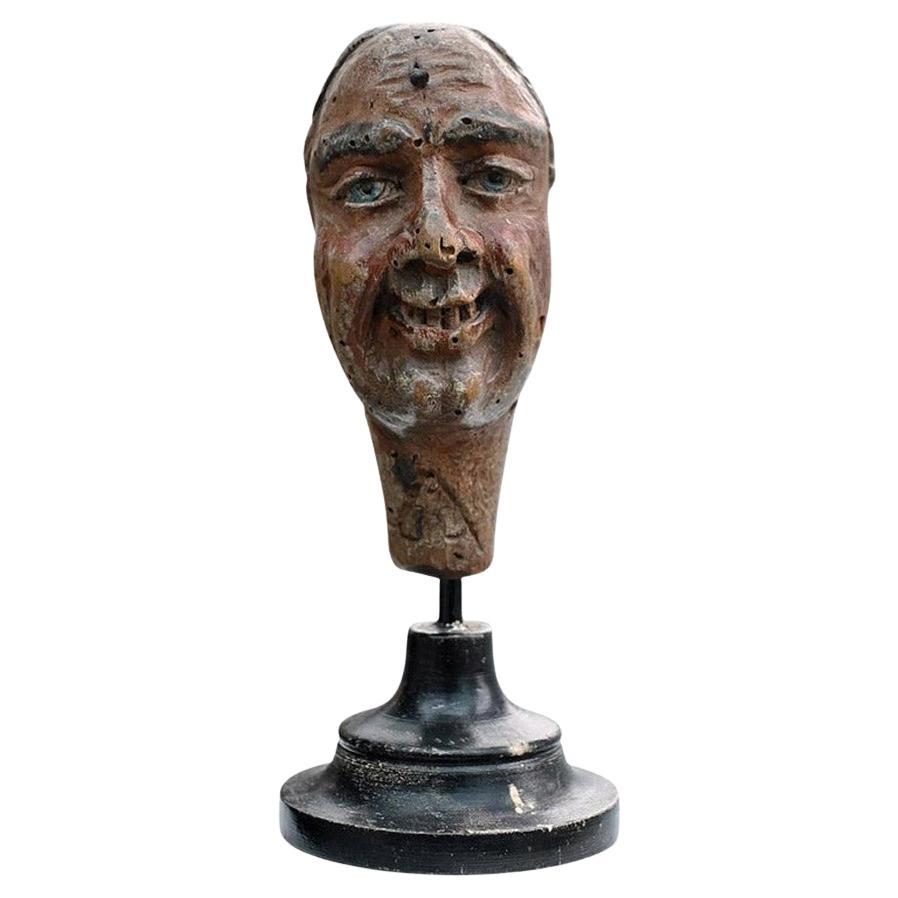 Early 20th century hand carved puppet head