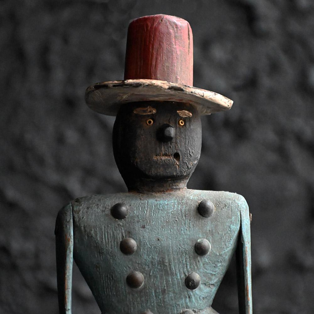 Early 20th Century Hand Crafted Folk-art American Jig Doll Figure

A charming and quirky hand-crafted early 20th Century folk-art American jig doll figure. Wearing a wood and tin hat with ceramic pins for eyes. All hand painted detail, likely to