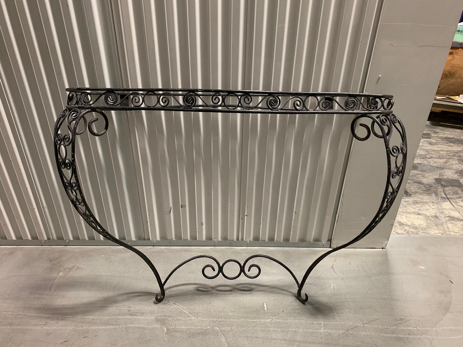 Early 20th century hand-forged Iron wall-mount console with circle and 