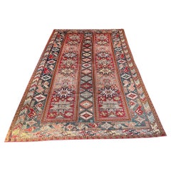Tappeto Kazak annodato a mano dei primi del Novecento  10'4" x 6'9"